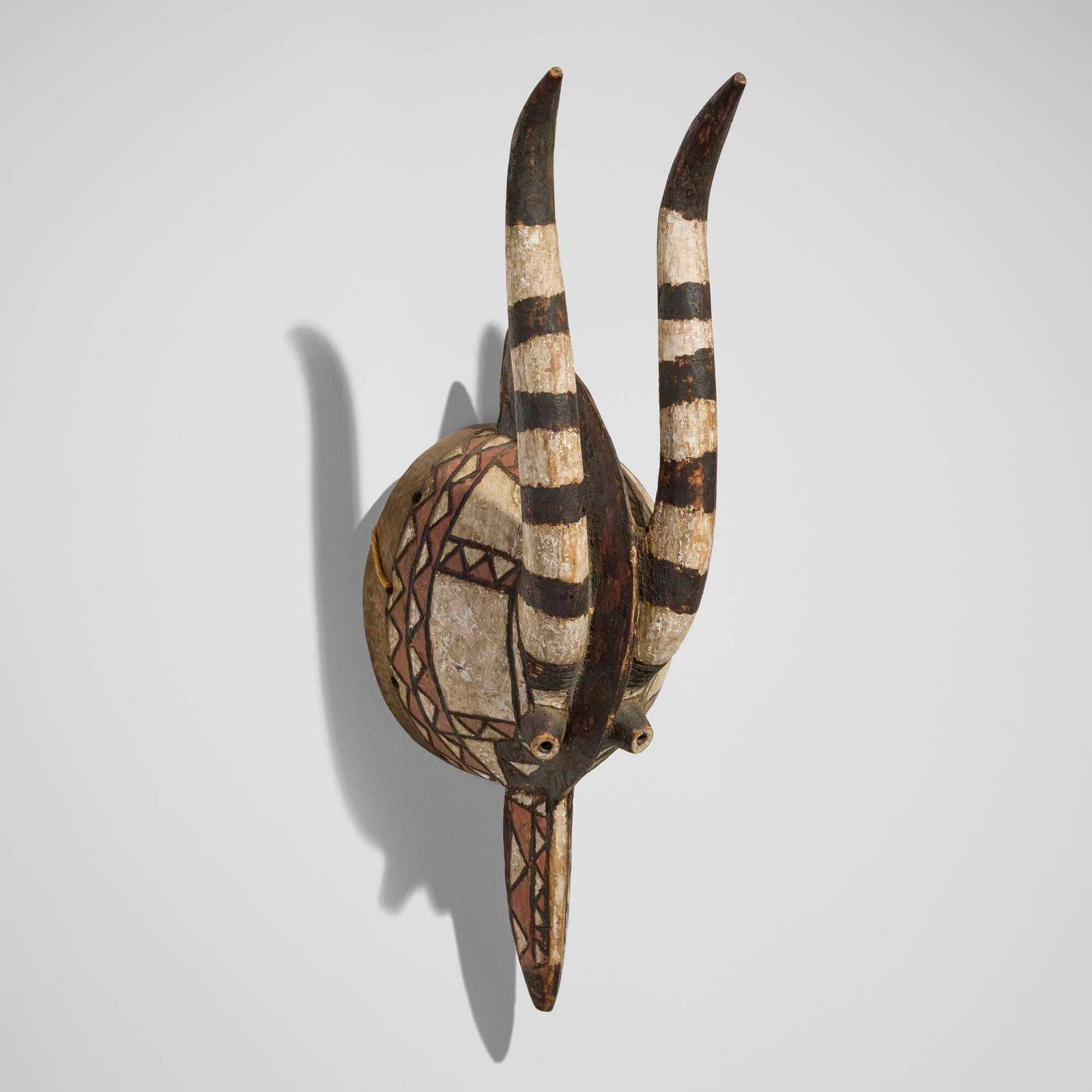 Mossi, Antelope mask: Mossi Antelope mask Burkina Faso, 20th century carved wood, pigment 20.5 h x 7 w x 6.75 d in (52 x 18 x 17 cm) Provenance: The Sam and Beverly Maloof Collection