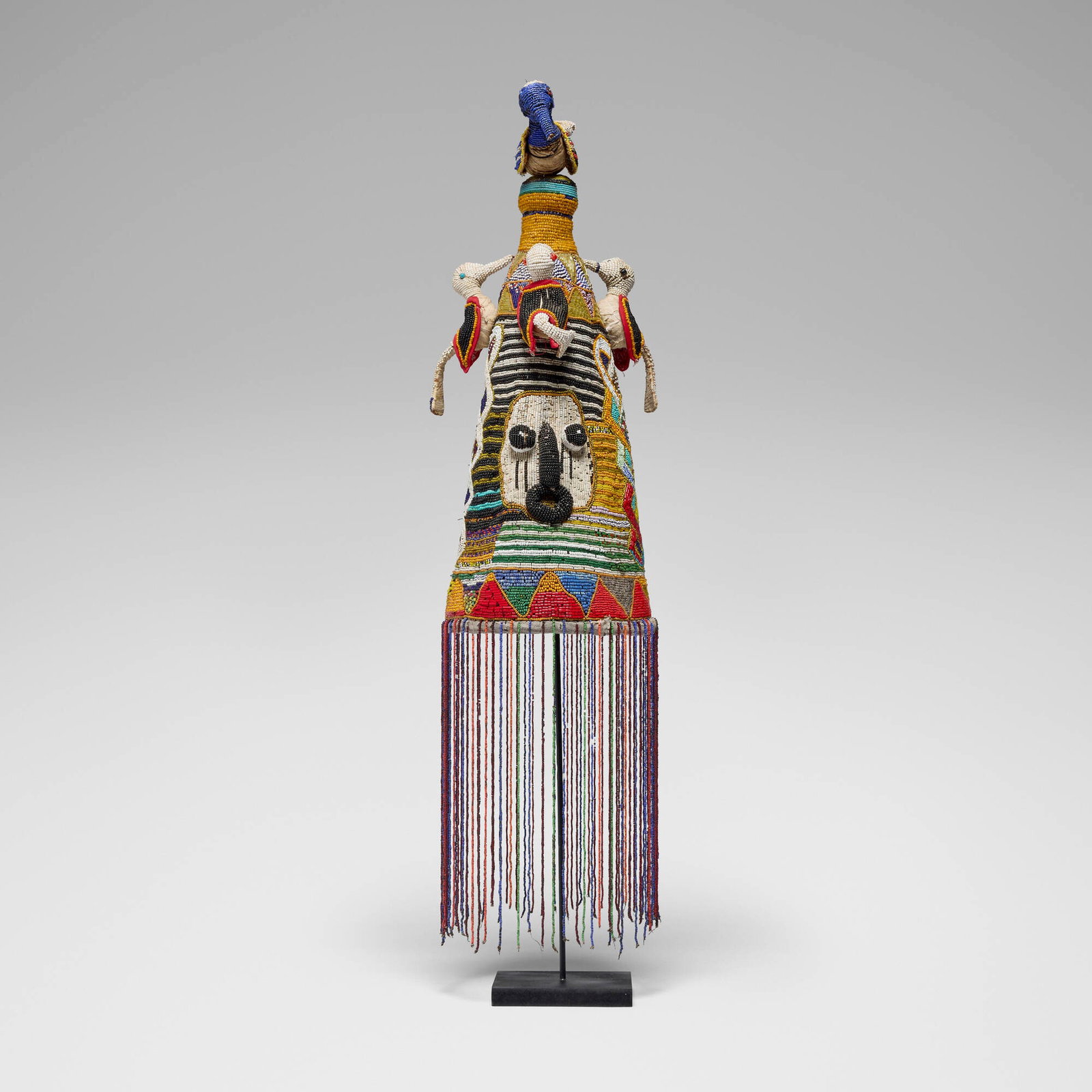 Yoruba, Adenla (crown): Yoruba Adenla (crown) Nigeria, mid-20th century glass beads, textile 23.5 h x 9.5 dia in (60 x 24 cm) Provenance: The Sam and Beverly Maloof Collection This work will ship from Los Angeles,
