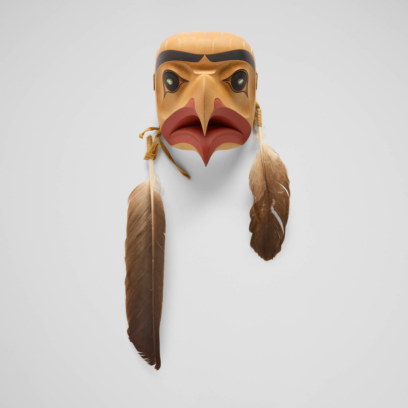 Dale Campbell, Eagle mask: Dale Campbell Eagle mask Tahltan, Canadian First Nations, 1984 carved and painted wood, feathers, mother of pearl, leather 7.5 h x 6 w x 6 d in (19 x 15 x 15 cm) Incised signature, title, and date to