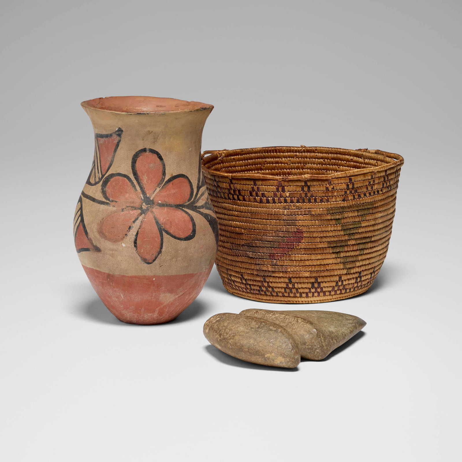 Native American, Collection of three objects: Native American Collection of three objects 20th century woven jute, painted terracotta, stone 9 h x 6 dia in (23 x 15 cm) 5.75 h x 9 w x 6 dia in (15 x 23 x 15 cm) 1.5 h x 8 w x 5.5 d in (4 x 20 x