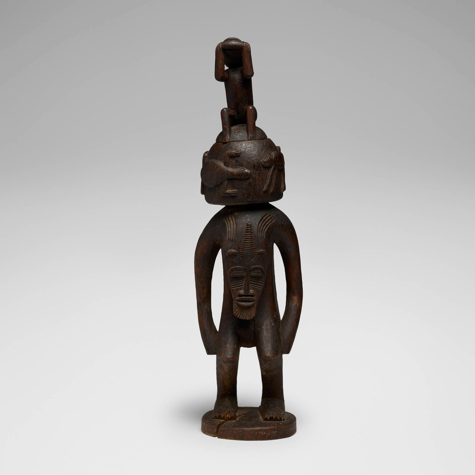 Kuba, Figurative vessel: Kuba Figurative vessel Democratic Republic of the Congo, 20th century carved wood 32.75 h x 9 w x 8.5 d in (83 x 23 x 22 cm) Provenance: Private Collection, Maryland This work will ship from Chicago,