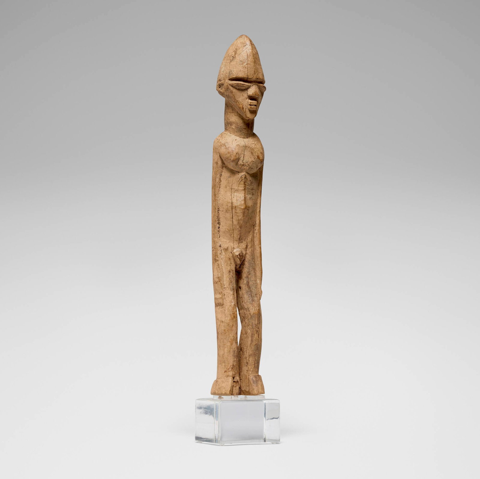 Lobi, Bateba figure: Lobi Bateba figure Ghana, 20th century carved wood 28.5 h x 4.75 w x 4 d in (72 x 12 x 10 cm) This work will ship from Los Angeles, California.
