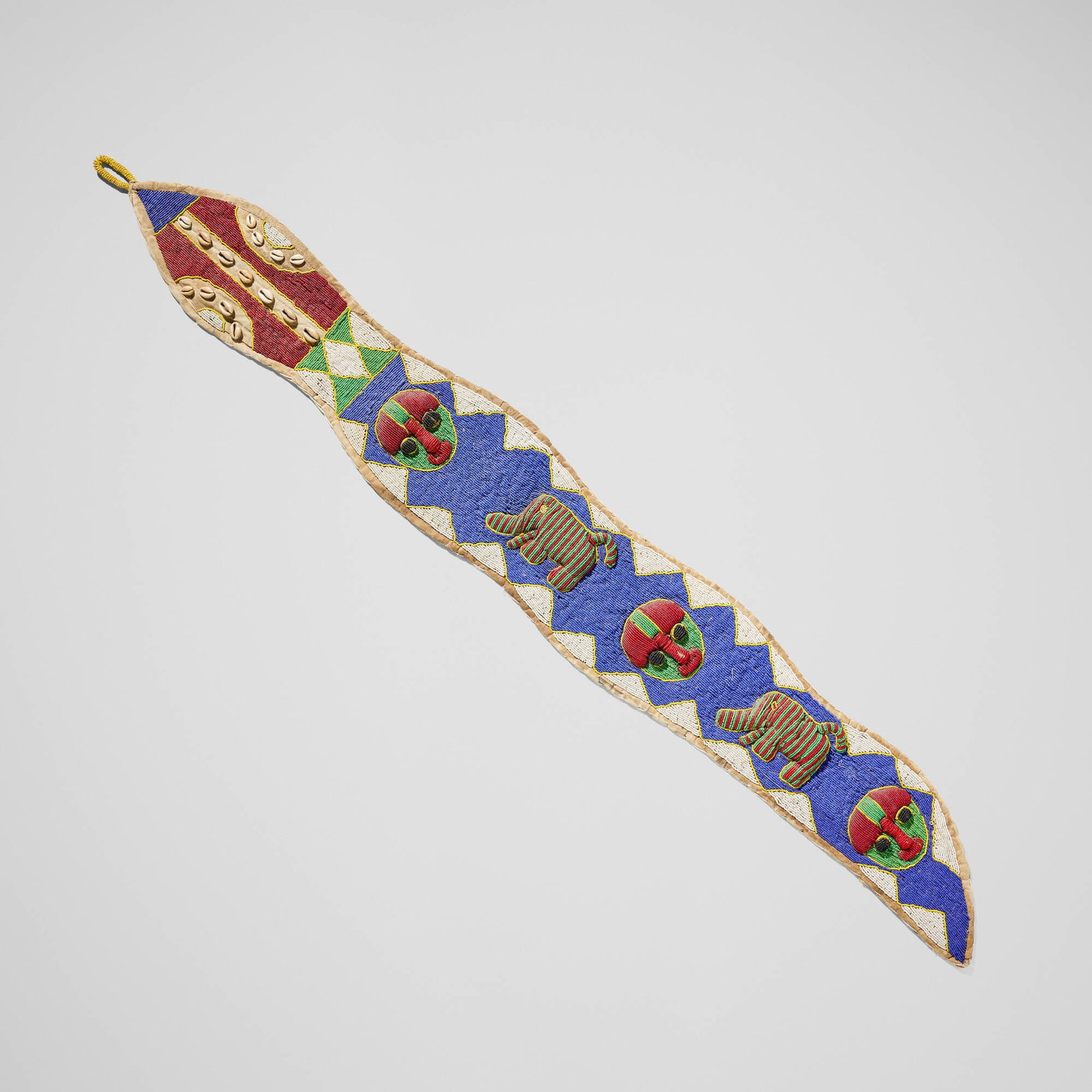 Yoruba, Diviners belt: Yoruba Diviners belt Nigeria, 20th century glass beads, textile, cowrie shells 58 h x 7.5 w x 1 d in (147 x 19 x 3 cm) This work will ship from Los Angeles, California.