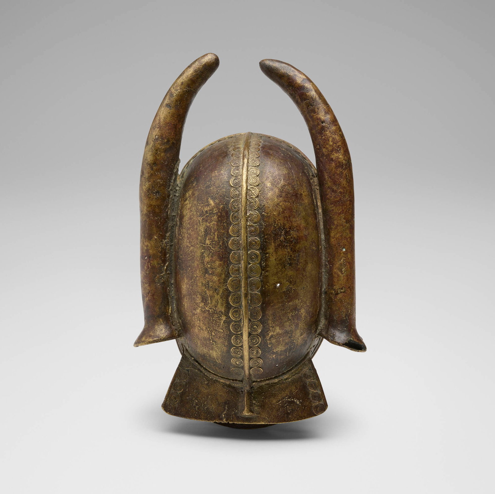 Senufo, Helmet mask: Senufo Helmet mask Cote d'Ivoire, 20th century bronze 15.5 h x 9.5 w x 5.25 d in (39 x 24 x 13 cm) This work will ship from Chicago, Illinois.