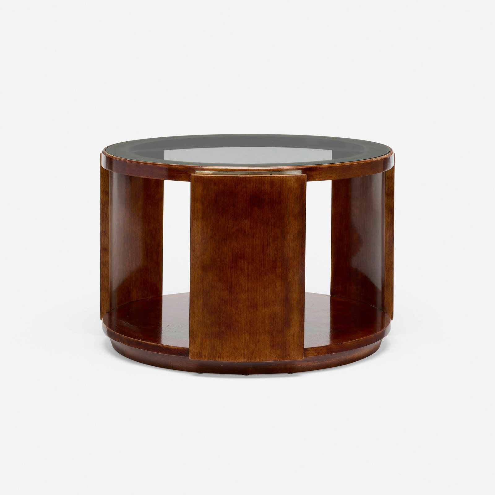 Dominique (Andre Domin and Marcel Geneviere), Occasional table: Dominique (Andre Domin and Marcel Geneviere) Occasional table France, c. 1930 mahogany, glass, nickel-plated brass 21.5 h x 32 dia in (55 x 81 cm) Branded manufacturer's mark to underside