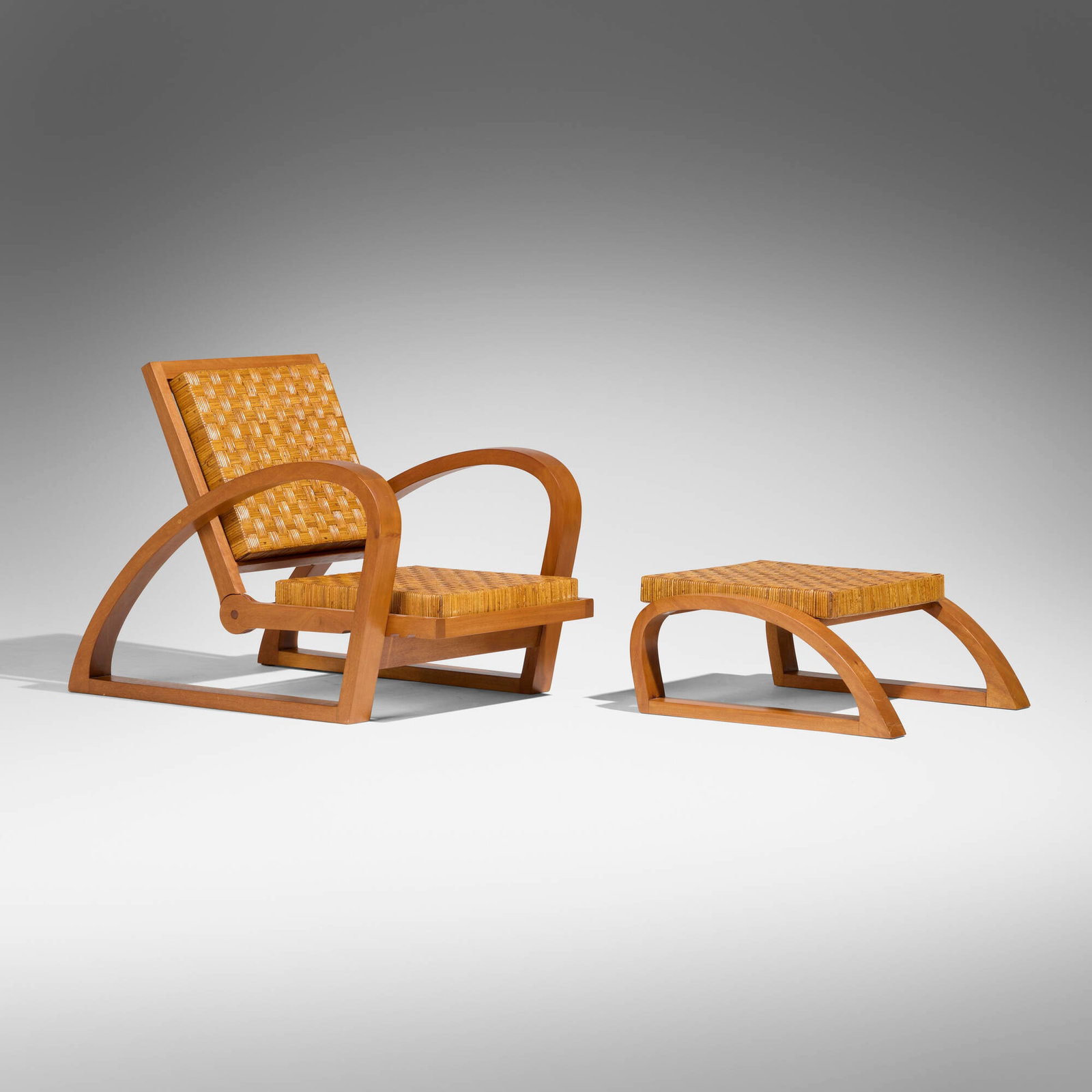 Francis Jourdain, Lounge chair and ottoman: Francis Jourdain Lounge chair and ottoman France, c. 1930 pear wood, cane chair: 30.75 h x 27.25 w x 35 d in (78 x 69 x 89 cm) ottoman: 11.25 h x 27.25 w x 26 d in (29 x 69 x 66 cm)