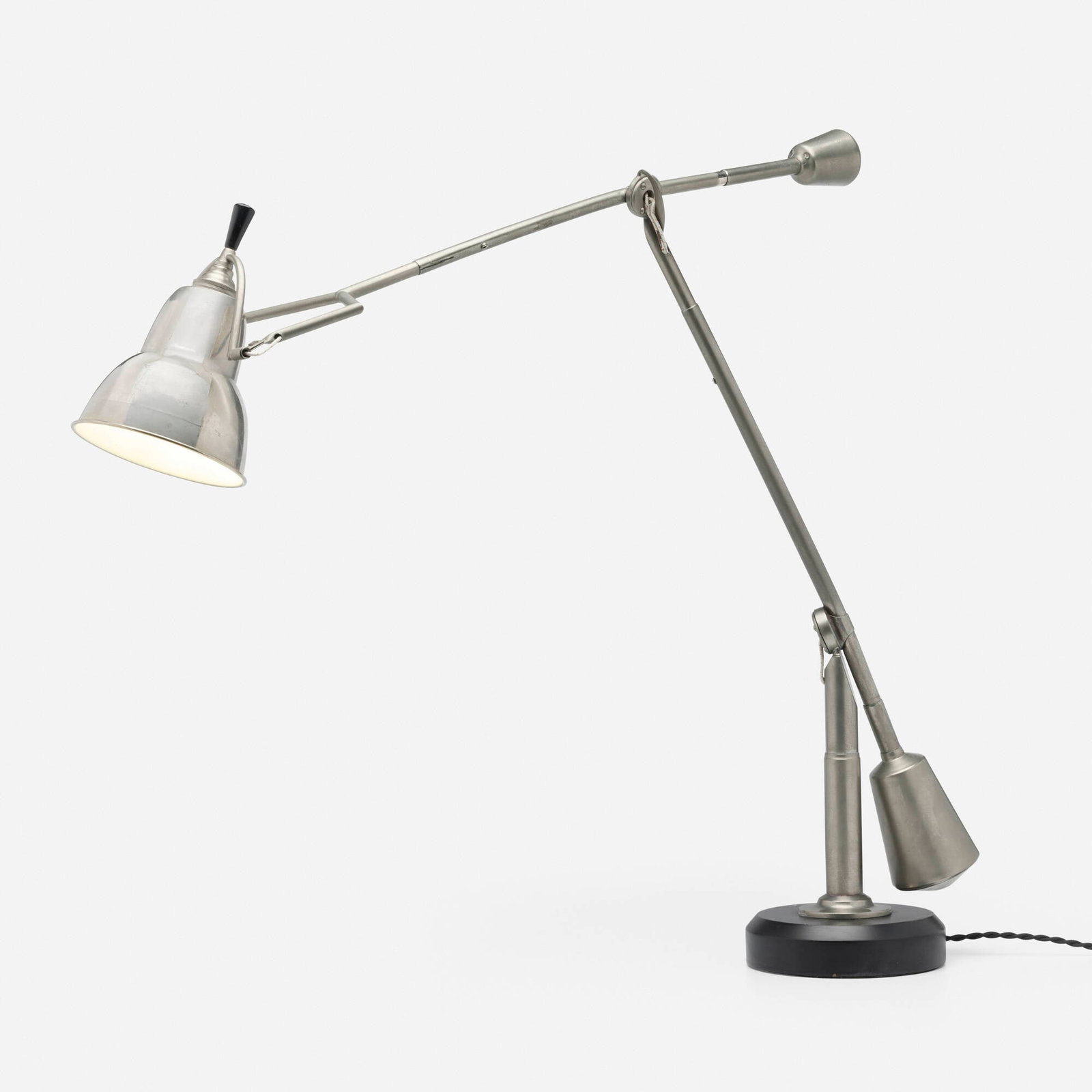 Edouard-Wilfred Buquet, Articulated table lamp: Edouard-Wilfred Buquet Articulated table lamp France, 1927 / c. 2000 nickel-plated brass, aluminum, lacquered wood 28 h x 27.5 w x 8 d in (71 x 70 x 20 cm) An example of this design is in the