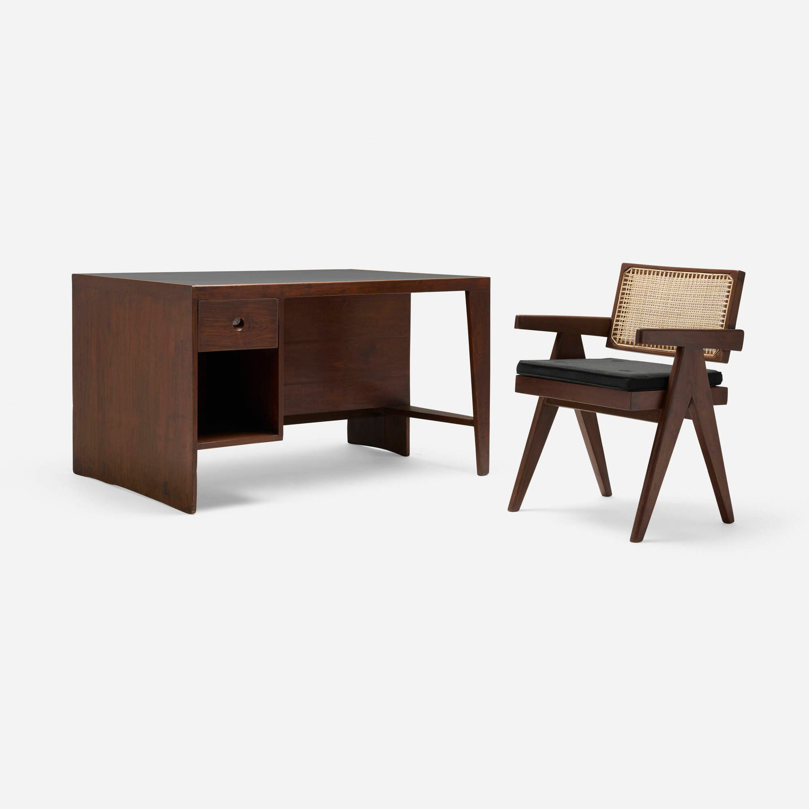 Pierre Jeanneret, Desk and chair from Chandigarh: Pierre Jeanneret Desk and chair from Chandigarh France/India, c. 1957-59, c. 1960 teak, leather, cane, upholstery, aluminum desk: 28 h x 47.5 w x 32.25 d in (71 x 121 x 82 cm) chair: 31.25 h x 19.7