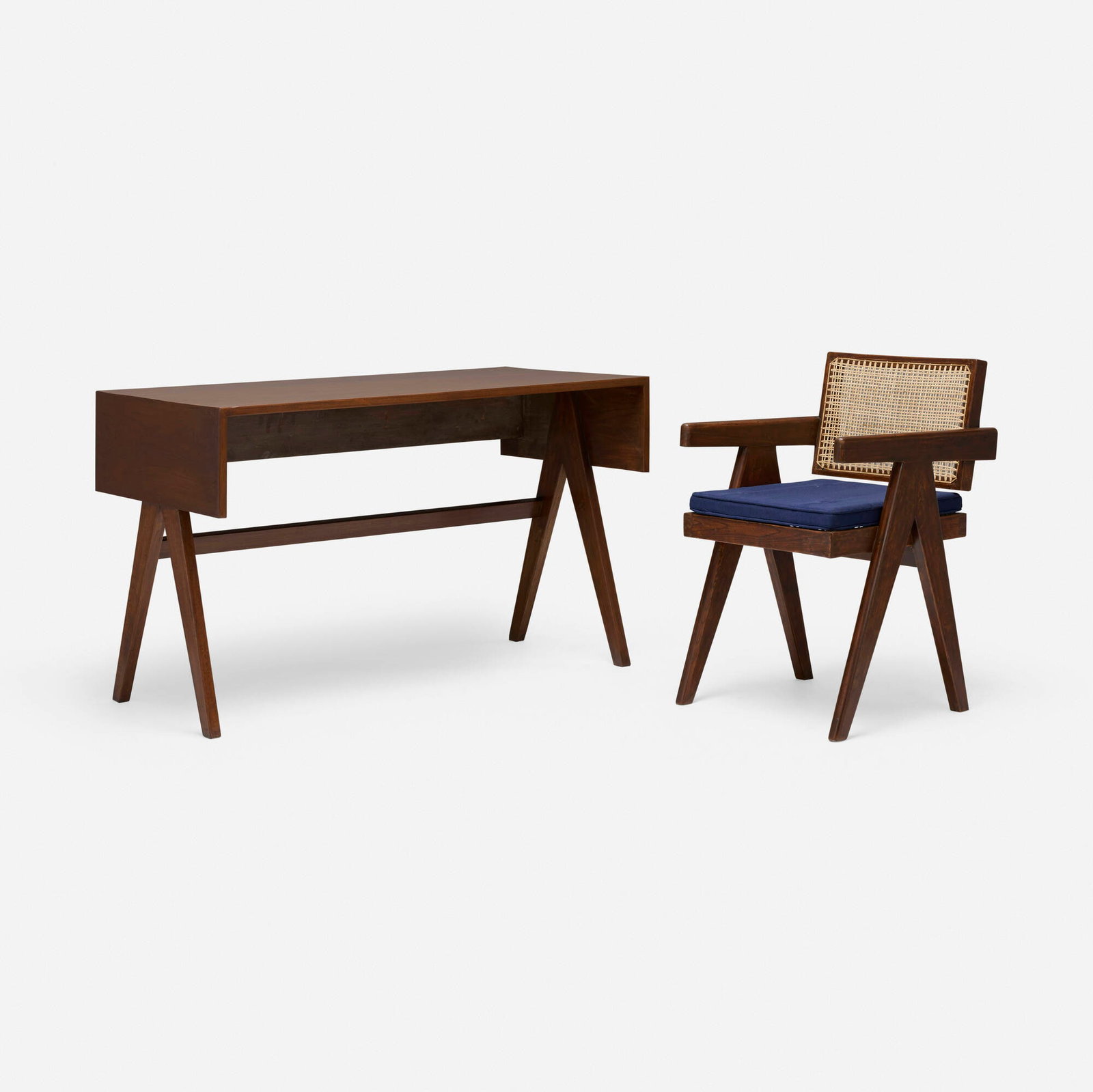 Pierre Jeanneret, Desk and chair from Chandigarh: Pierre Jeanneret Desk and chair from Chandigarh France/India, c. 1958-1960 teak, cane, upholstery desk: 29.25 h x 48 w x 24 d in (74 x 122 x 61 cm) chair: 32 h x 20.25 w x 21 d in (81 x 51 x 53 cm)