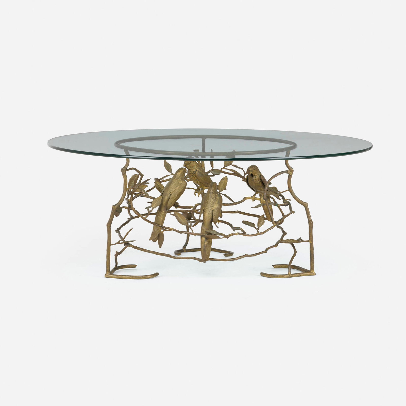Modern, Coffee table with parrots: Modern Coffee table with parrots c. 1970 brass, glass 16.875 h x 42 dia in (43 x 107 cm) This work will ship from Lambertville, New Jersey.