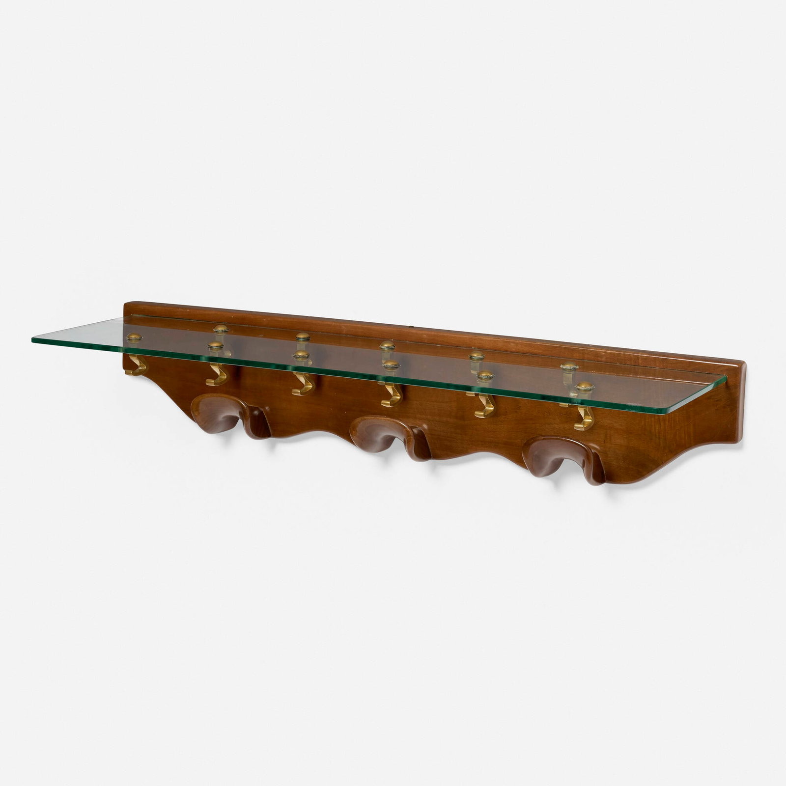 Osvaldo Borsani, Rare wall-mounted coatrack shelf: Osvaldo Borsani Rare wall-mounted coatrack shelf Arredamenti Borsani Varedo Italy, c. 1945 glass, brass, beech 8 h x 41 w x 11.75 d in (20 x 104 x 30 cm) Provenance: Private Collection This work will