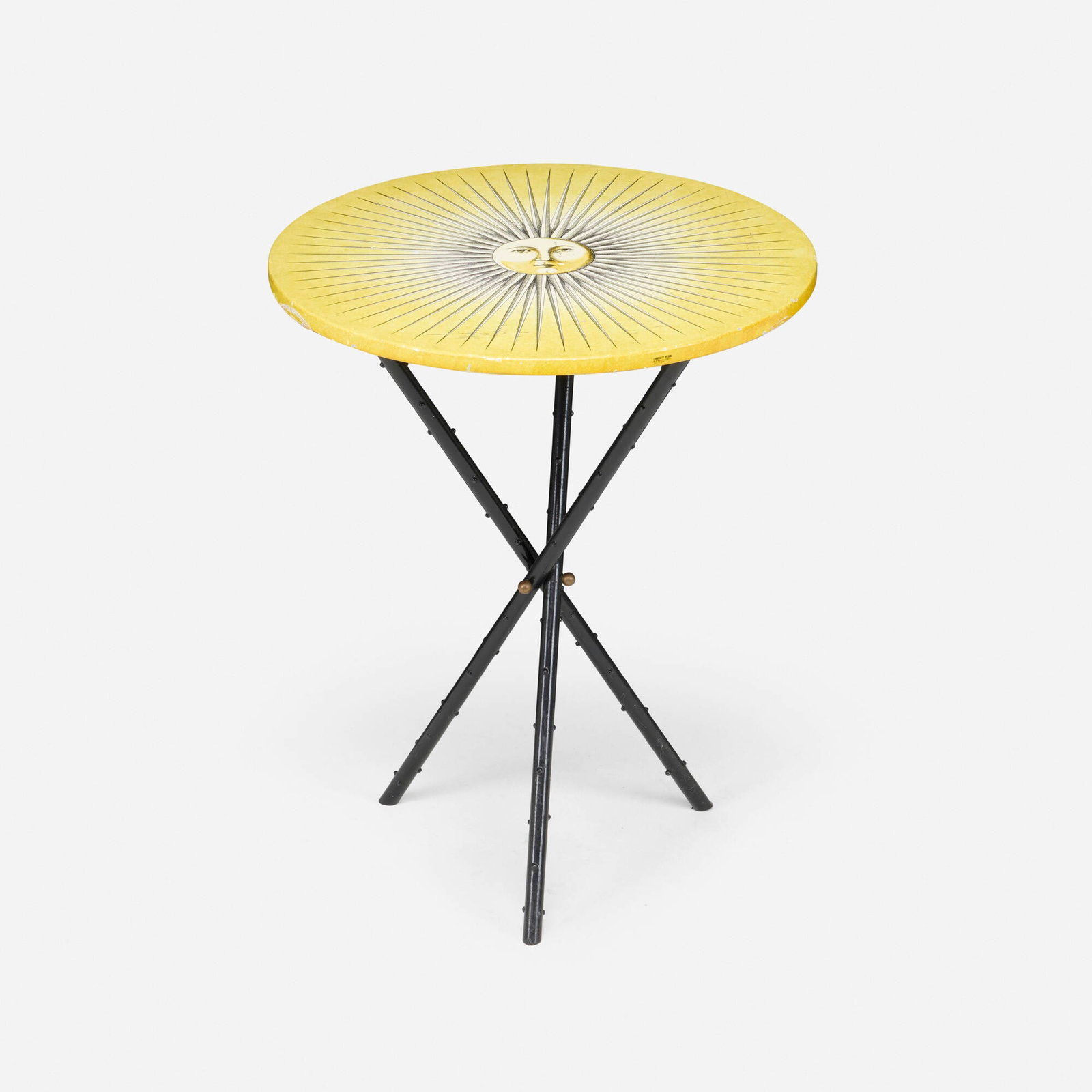 Piero Fornasetti, Sun occasional table: Piero Fornasetti Sun occasional table Fornasetti Milano Italy, 1991 screenprint on lacquered wood, rubberized steel 28 h x 23.5 dia in (71 x 60 cm) Paper manufacturer's label to under