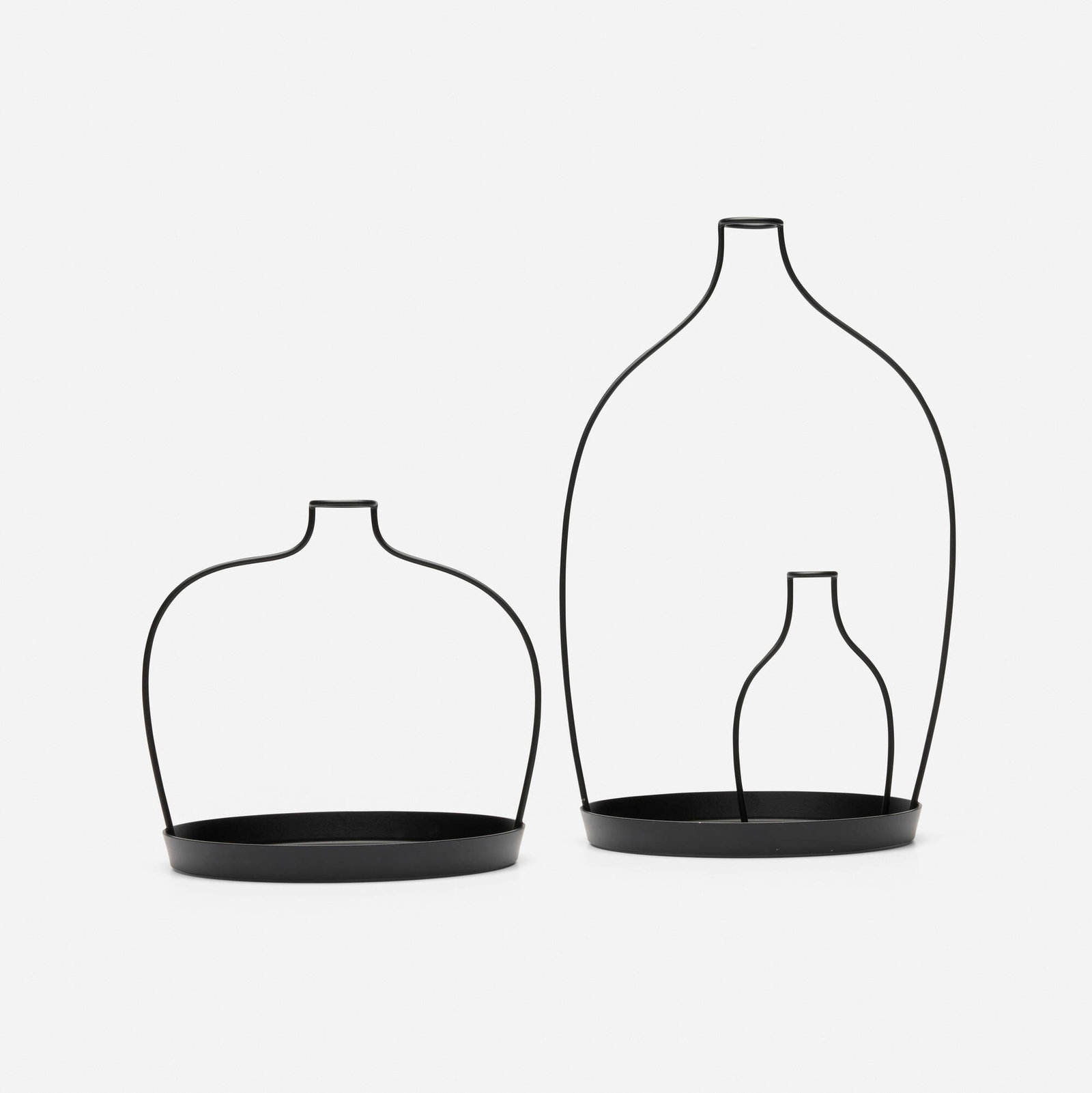 nendo, 610mm vase; 1370mm vase (two works from the Thin Black Lines series): nendo 610mm vase; 1370mm vase (two works from the Thin Black Lines series) Japan, 2010 powder-coated steel 14.5 h x 9 w x 7.875 d in (37 x 23 x 20 cm) 7.75 h x 8.75 w x 7.875 d in (20 x 22 x 20 cm)