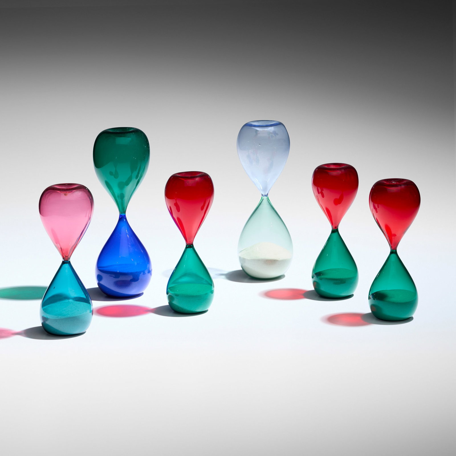 Fulvio Bianconi and Paolo Venini, Clessidre (Hourglasses), set of six: Fulvio Bianconi and Paolo Venini Clessidre (Hourglasses), set of six Venini Italy, c. 1957 / produced later glass, sand tallest: 9.75 h x 3.375 dia in (25 x 9 cm) shortest: 7.5 h x 2.625 dia in (19 x