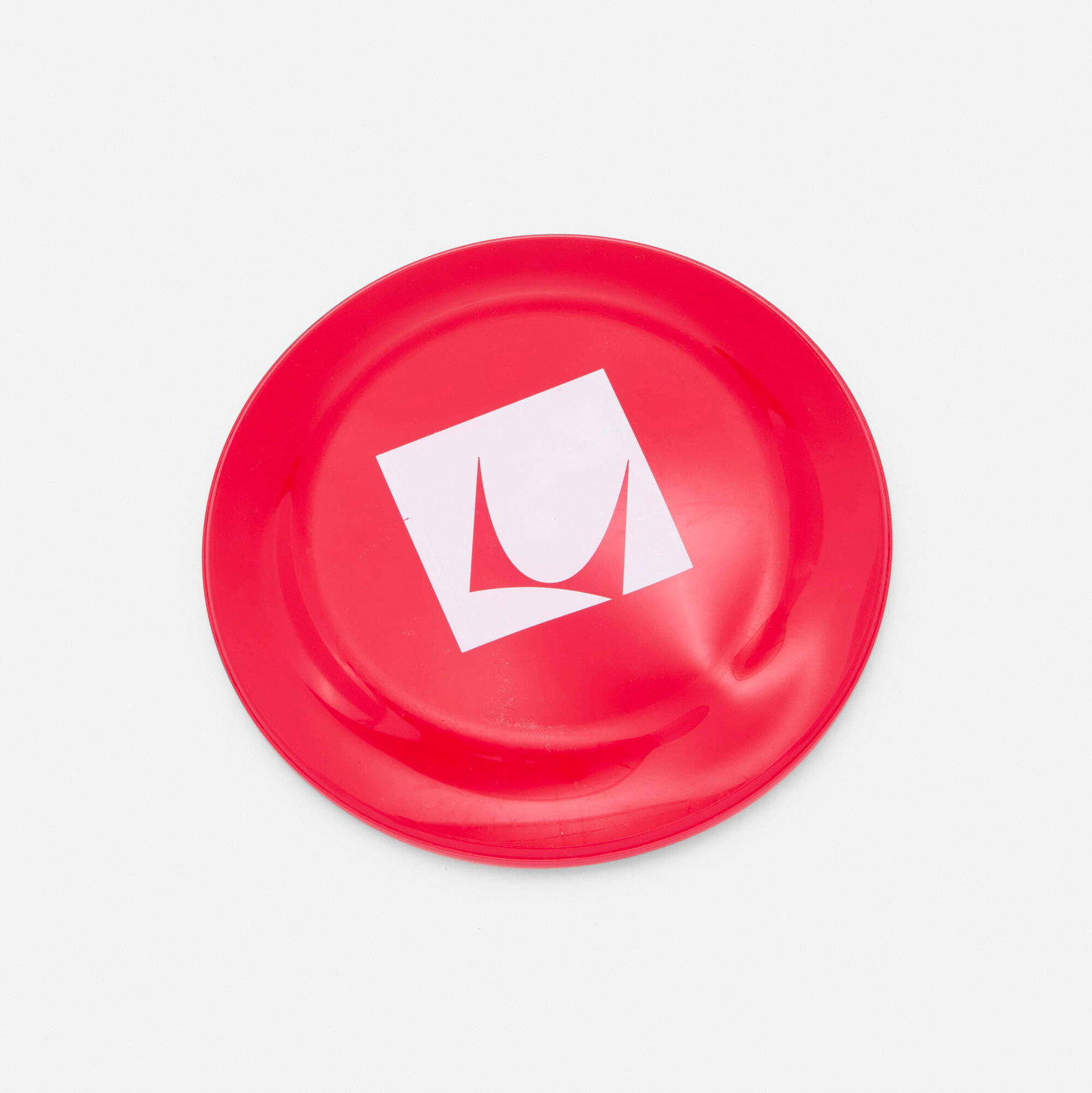 Herman Miller, Frisbee: Herman Miller Frisbee USA, c. 1980 plastic 9.5 dia in (24 cm) Printed manufacturer's logo to top. This work will ship from Chicago, Illinois.