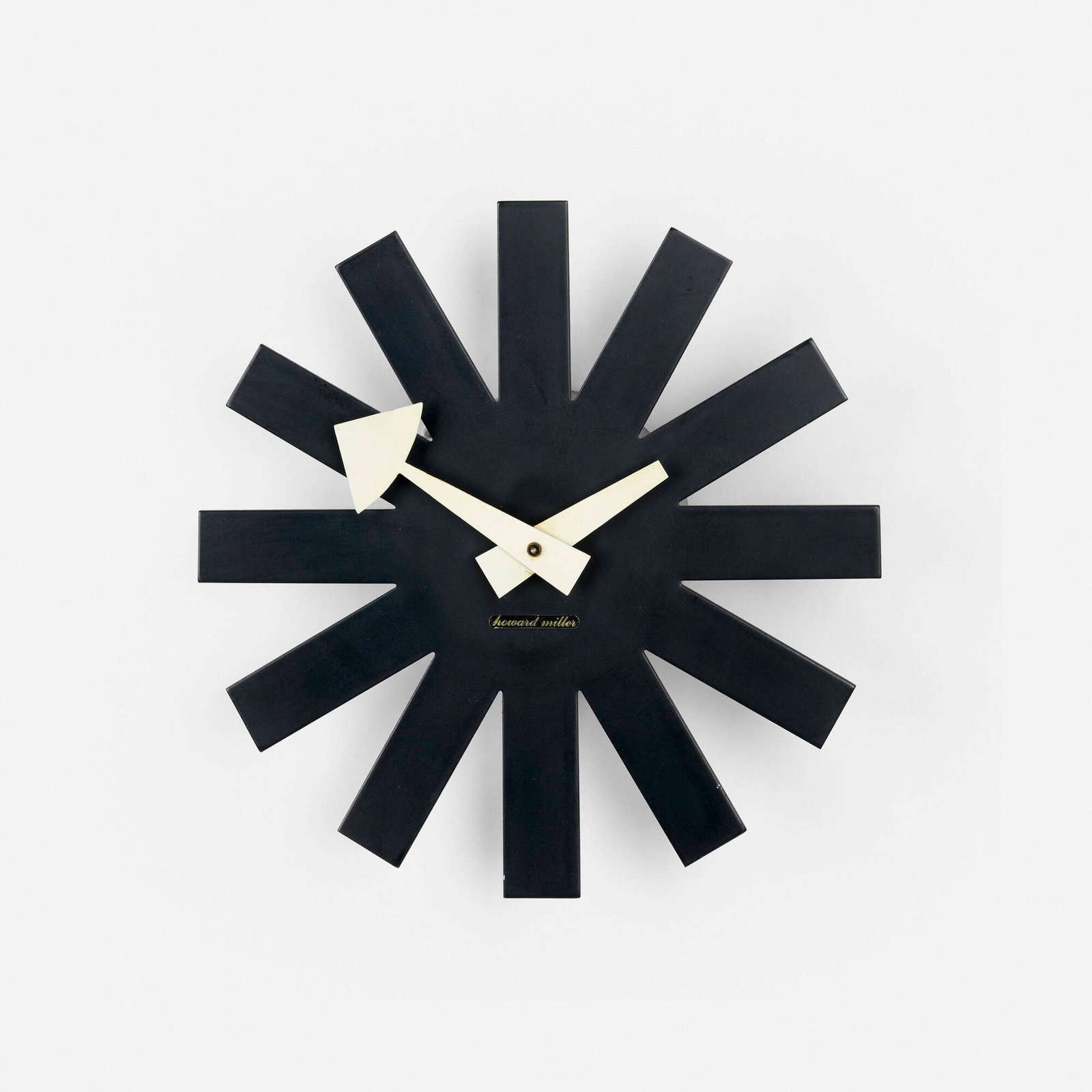 George Nelson & Associates, Asterisk wall clock, model 2213: George Nelson & Associates Asterisk wall clock, model 2213 Howard Miller Clock Company USA, c. 1953 enameled steel and aluminum 3 h x 10 dia in (8 x 25 cm) Impressed manufacturer's mark to revers
