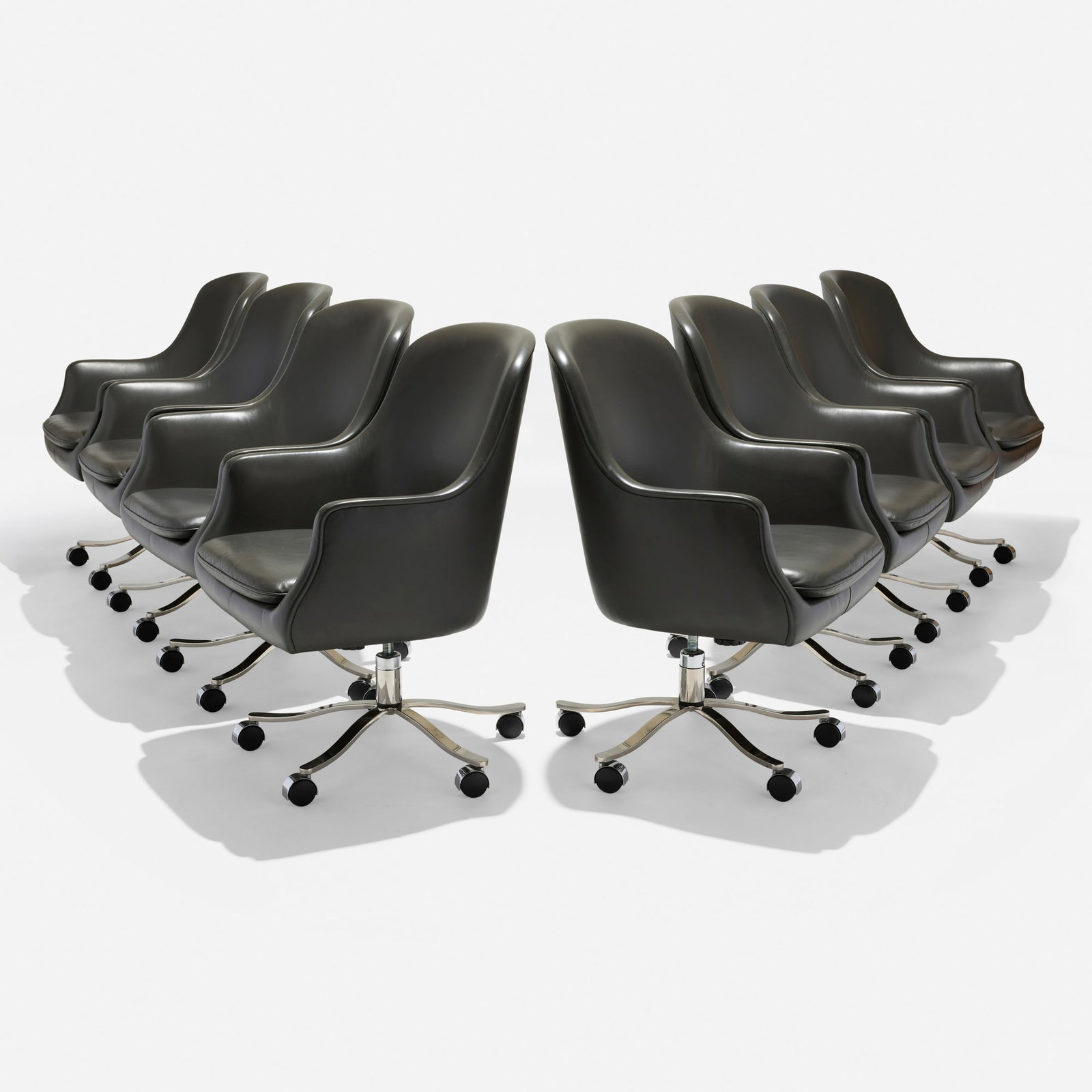 Nicos Zographos, Swivel armchairs, set of eight: Nicos Zographos Swivel armchairs, set of eight Zographos Designs Ltd. Greece/USA, 1964 / c. 1990 leather upholstery, chrome-plated stainless steel 37.5 h x 25.5 w x 29 d in (95 x 65 x 74 cm) Impressed