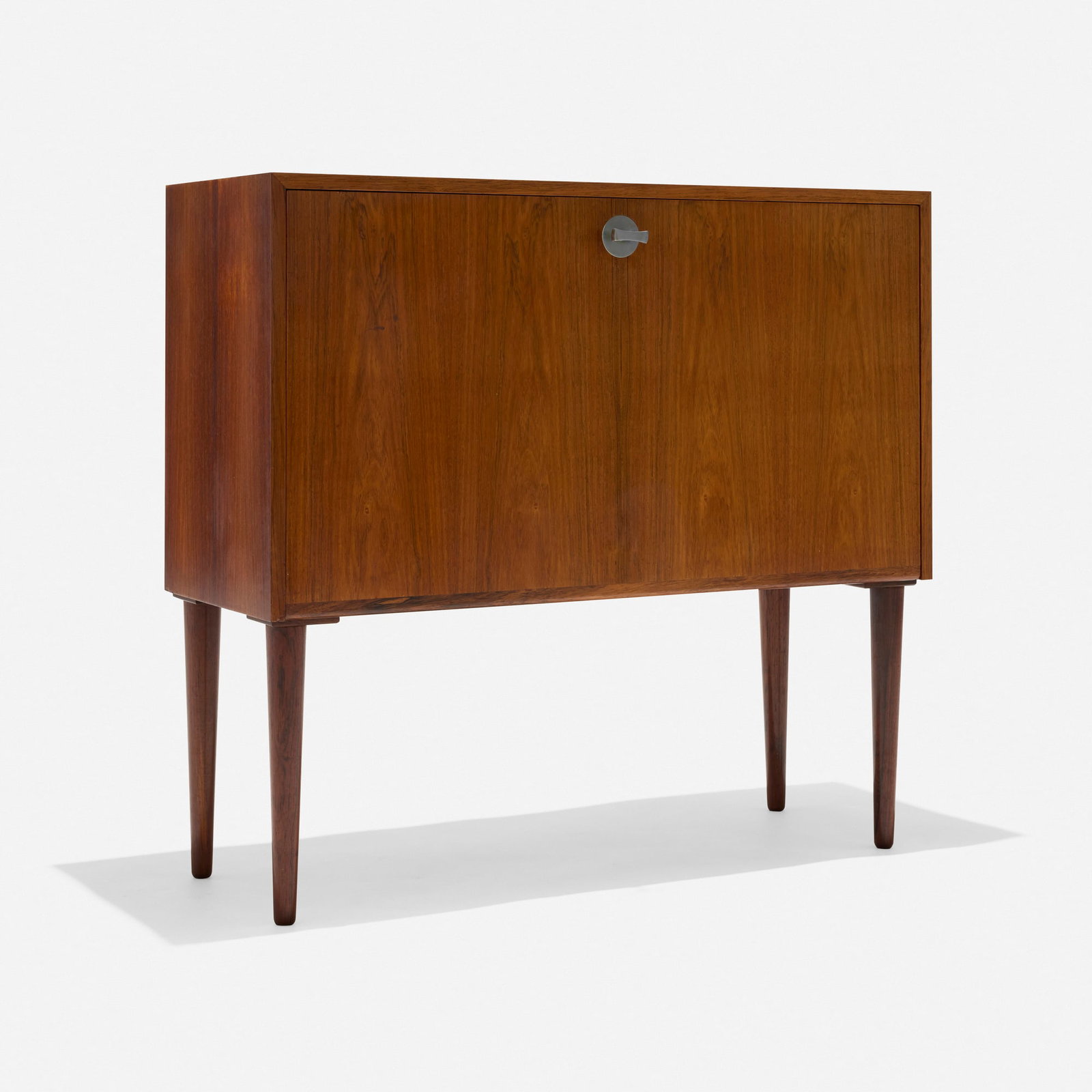 Danish, Cabinet: Danish Cabinet c. 1965 rosewood, aluminum 29.75 h x 31.5 w x 13 d in (76 x 80 x 33 cm) Cabinet features a drop-front door concealing one adjustable shelf. Provenance: Collection of Normand Mainville