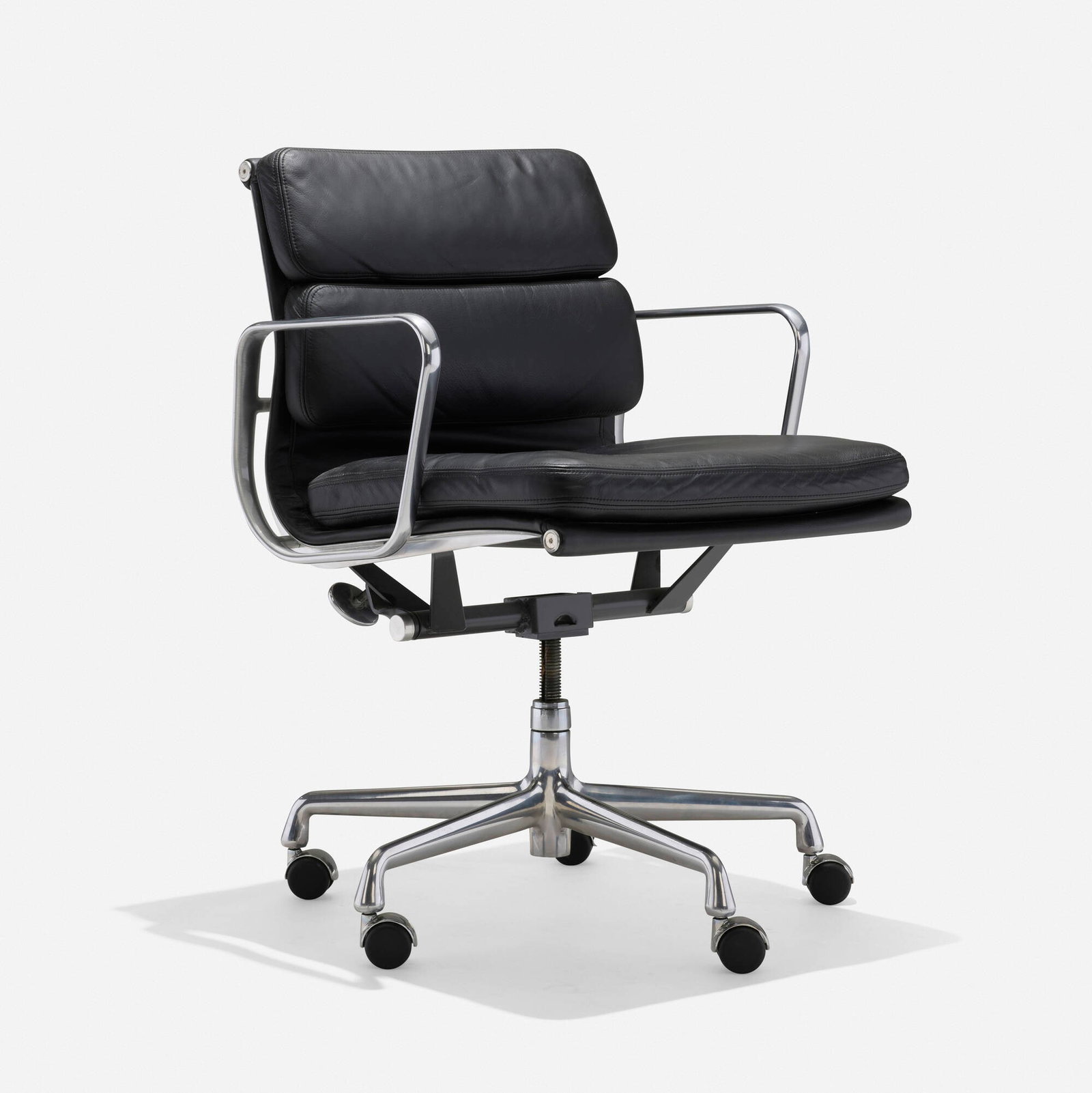 Charles and Ray Eames, Soft Pad Managment chair: Charles and Ray Eames Soft Pad Managment chair Herman Miller USA, 1969 / 2004 leather, aluminum, enameled steel 34 h x 23 w x 20 d in (86 x 58 x 51 cm) Paper manufacturer's label to underside