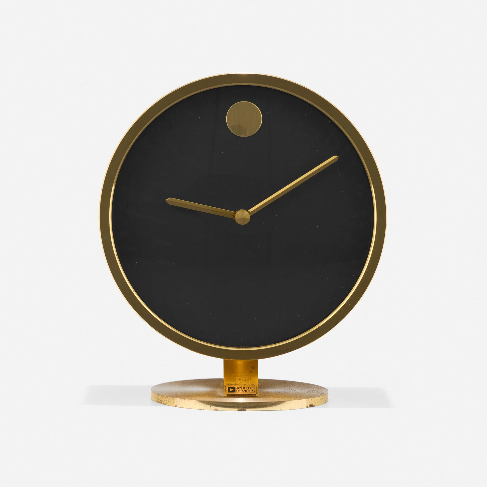 Nathan George Horwitt, Table clock: Nathan George Horwitt Table clock Howard Miller Clock Company USA, c. 1969-1970 brass, glass, enameled metal 5.25 h x 4.75 w x 3 d in (13 x 12 x 8 cm) Stamped manufacturer's mark to clock face