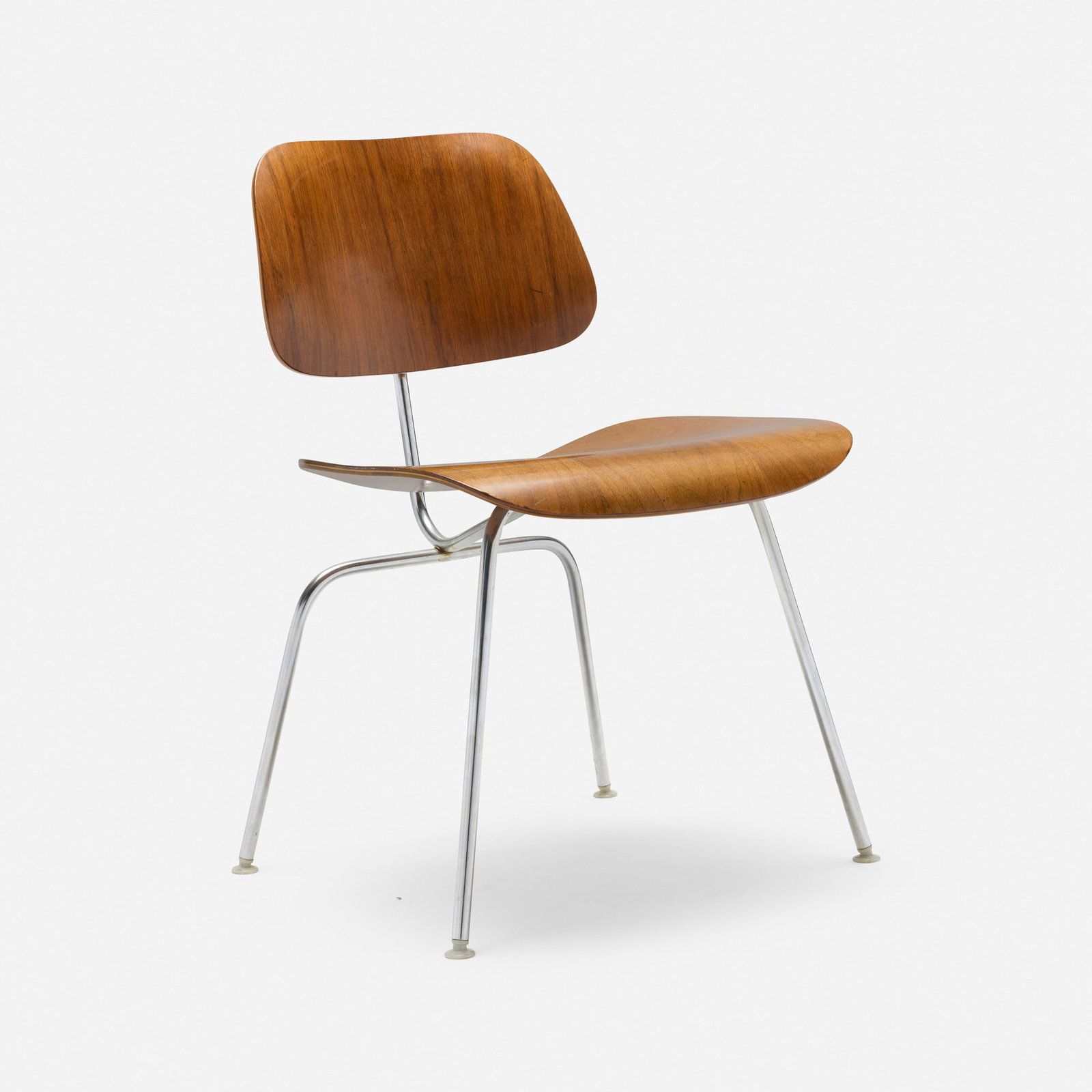 Charles and Ray Eames, DCM: Charles and Ray Eames DCM Herman Miller USA, 1946 / c. 1975 walnut plywood, chrome-plated stee, rubber, plastic 29.5 h x 19.5 w x 22 d in (75 x 50 x 56 cm) Provenance: Collection of Normand Mainville