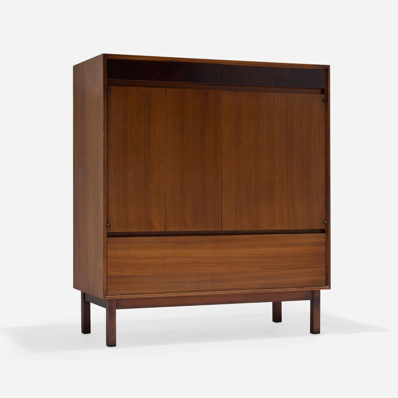John Stuart, Inc., Cabinet: John Stuart, Inc. Cabinet USA, c. 1955 walnut 48 h x 42.25 w x 19 d in (122 x 107 x 48 cm) Cabinet features three drawers, two bi-fold doors concealing three drawers, one fixed shelf, and storage. Met
