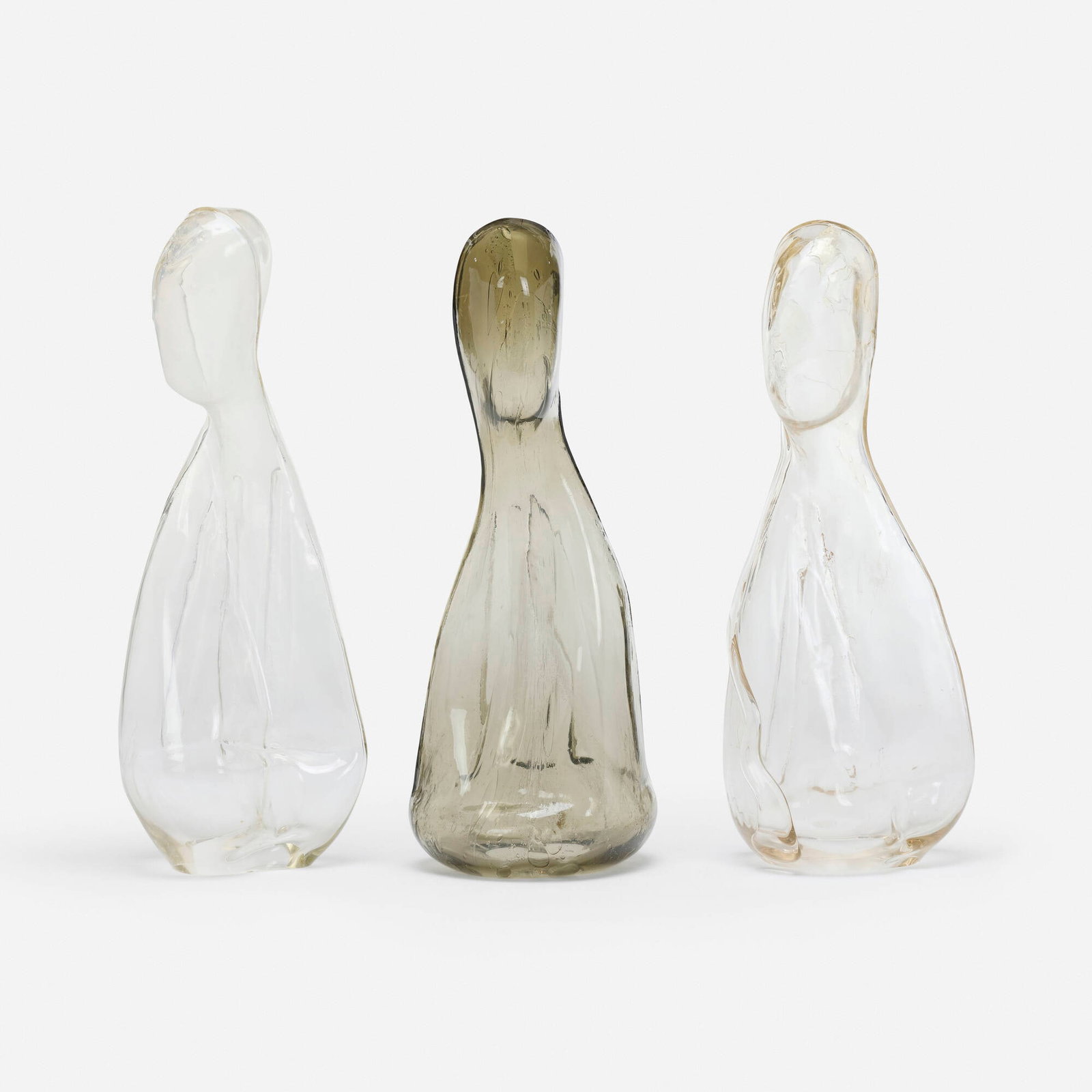 Rene Roubicek, Figures (three works): Rene Roubicek Figures (three works) 1978-79 glass 30.25 h x 11.5 w x 7.5 d in (77 x 29 x 19 cm) 29.25 h x 11 w x 9.5 d in (74 x 28 x 24 cm) 29 h x 11.5 w x 8 d in (74 x 29 x 20 cm) Incised signature