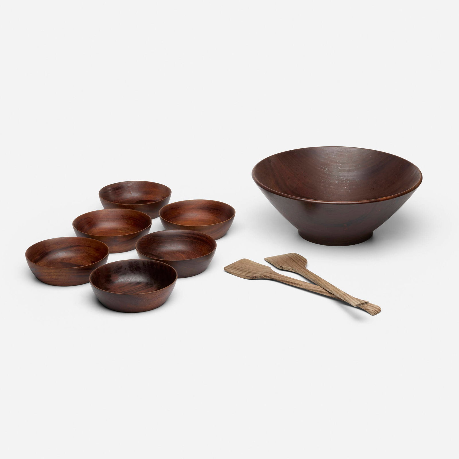Bob Stocksdale, Nine-piece salad set: Bob Stocksdale Nine-piece salad set USA, 1954 Guatemalan mahogany, walnut large bowl: 5 h x 13.5 dia in (13 x 34 cm) small bowl: 1.75 h x 6 dia in (4 x 15 cm) utensil: 13 h x 2.5 w x 0.25 d in (33 x