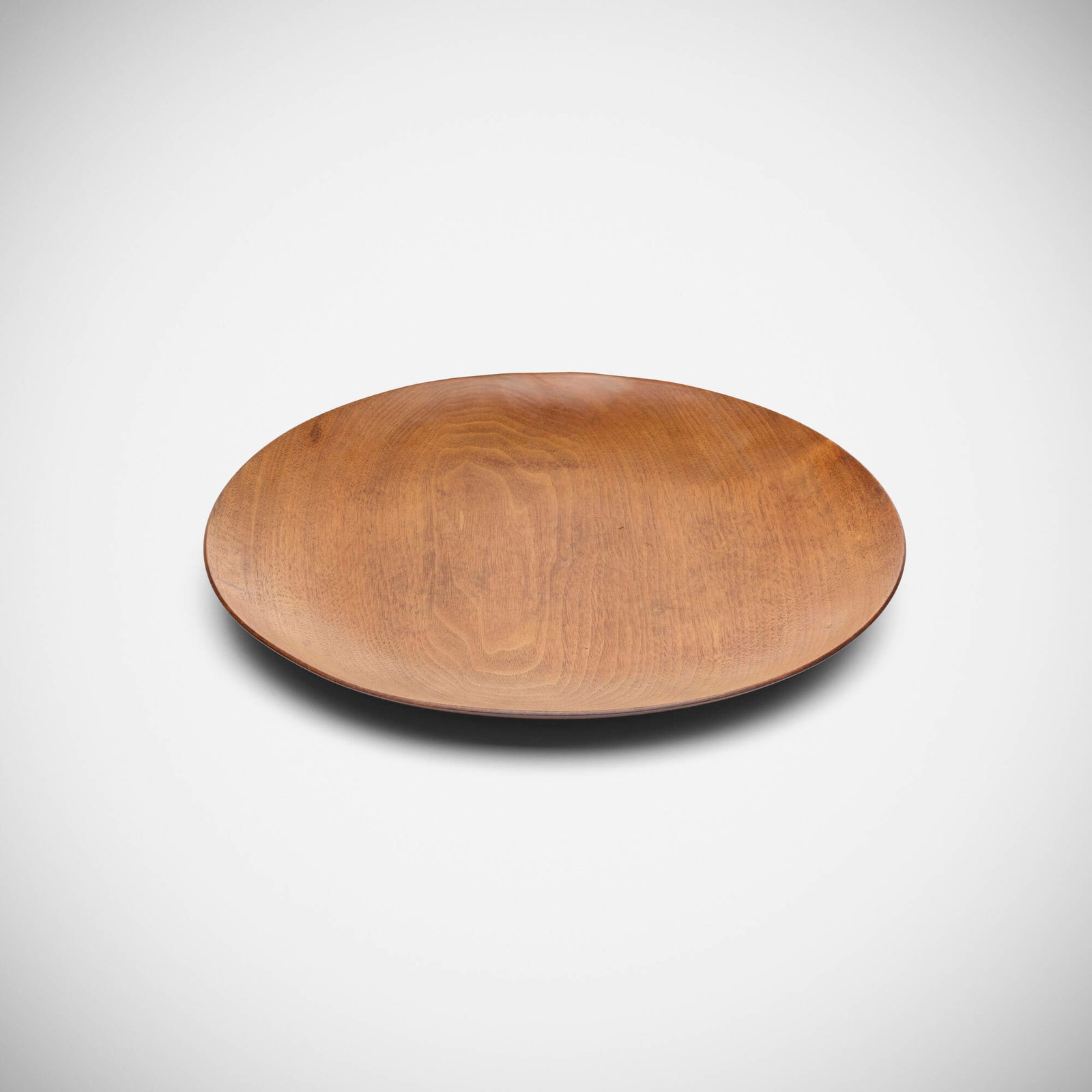 Arthur Espenet Carpenter, Platter: Arthur Espenet Carpenter Platter USA, c. 1960 black walnut 1.625 h x 14.375 dia in (4 x 37 cm) Incised signature, number and wood type to underside 'Espenet 2302 black walnut'. Provenance: