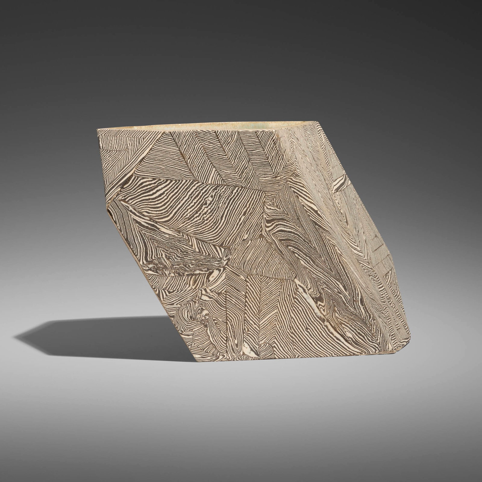 Cody Hoyt, Oblique vessel: Cody Hoyt Oblique vessel 2015 tinted and inlaid ceramic 8 h x 13.5 w x 6.75 d in (20 x 34 x 17 cm) Impressed signature and date to underside 'Hoyt 2015'. Provenance: Collection of Mark
