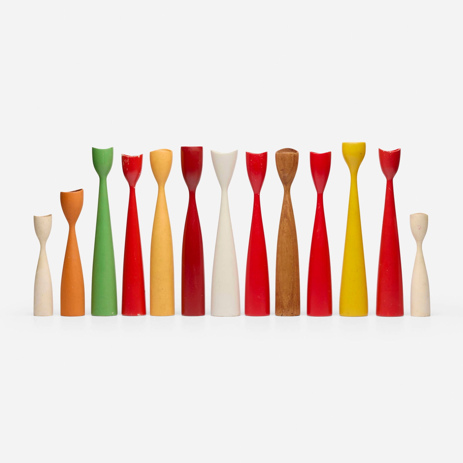Danish, Collection of thirteen candlesticks: Danish Collection of thirteen candlesticks c. 1960 painted wood tallest: 11.875 h x 2 dia in (30 x 5 cm) shortest: 7 h x 1.375 dia in (18 x 3 cm) Branded mark to underside of three examples
