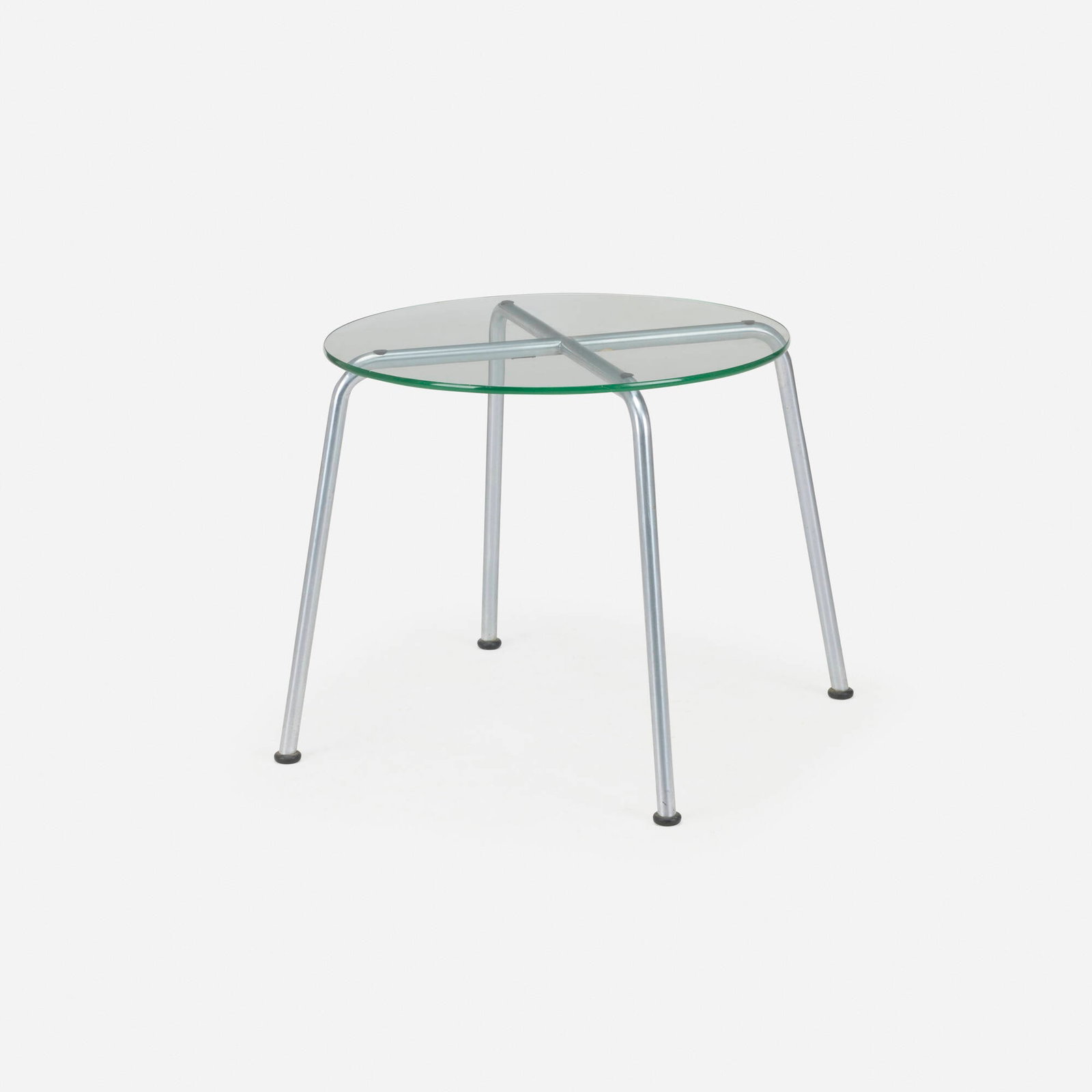 Modern, Occasional table: Modern Occasional table 20th century stainless steel, glass, rubber 23.5 h x 35 w x 35 d in (60 x 89 x 89 cm) Decal label to underside of base 't.h.delft 58-08641'. Provenance: University