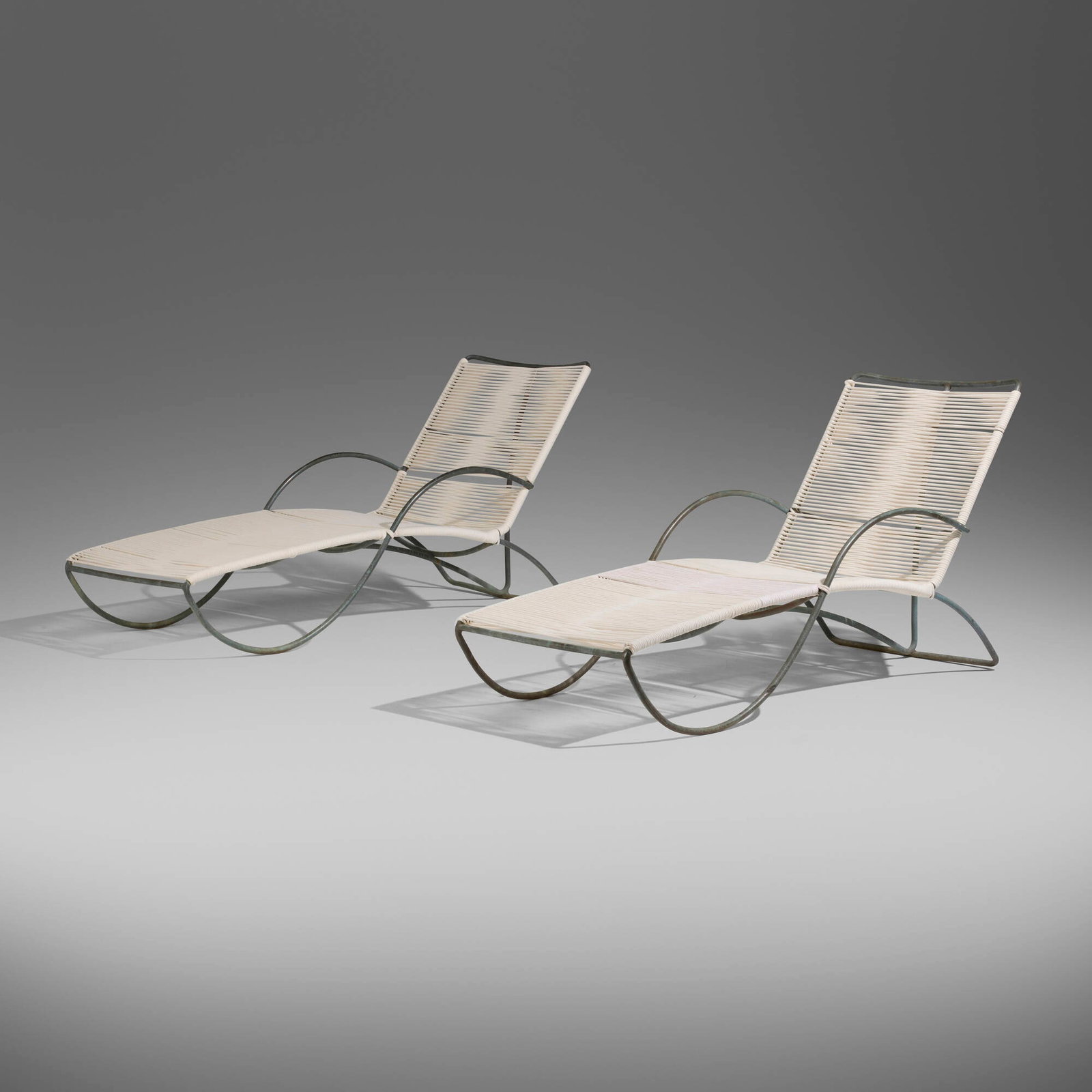 Walter Lamb, Chaise lounges model C-4700, pair: Walter Lamb Chaise lounges model C-4700, pair Brown Jordan USA, c. 1952 bronze, cotton cord 33 h x 27 w x 70 d in (84 x 69 x 178 cm) Provenance: Collection of Mark McDonald Literature: Walter Lamb,