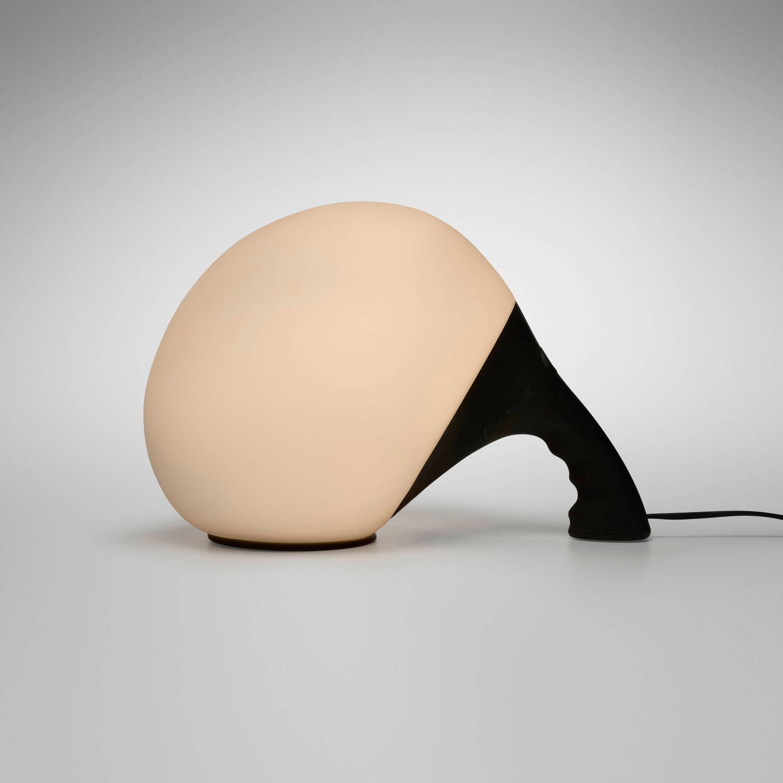 Luigi Colani, Biobrain table lamp: Luigi Colani Biobrain table lamp Yamagiwa Corporation Italy, 1986 frosted opal glass, rubber 9.25 h x 9.5 w x 13 d in (23 x 24 x 33 cm) This design won the 1986 Good Design Award from the Japan