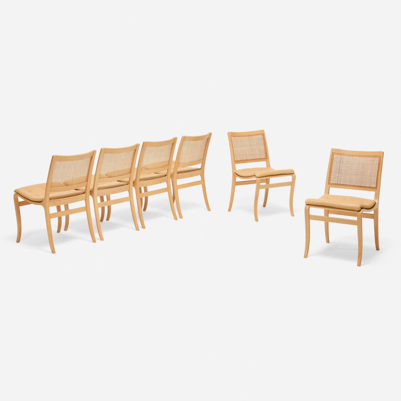 Bruno Mathsson, Kerstin dining chairs, set of six: Bruno Mathsson Kerstin dining chairs, set of six DUX Sweden, 1979 leather, beech, cane 31 h x 17.5 w x 21 d in (79 x 44 x 53 cm) Literature: Bruno Mathsson Mobelkonstnaren Glashusarkitekten