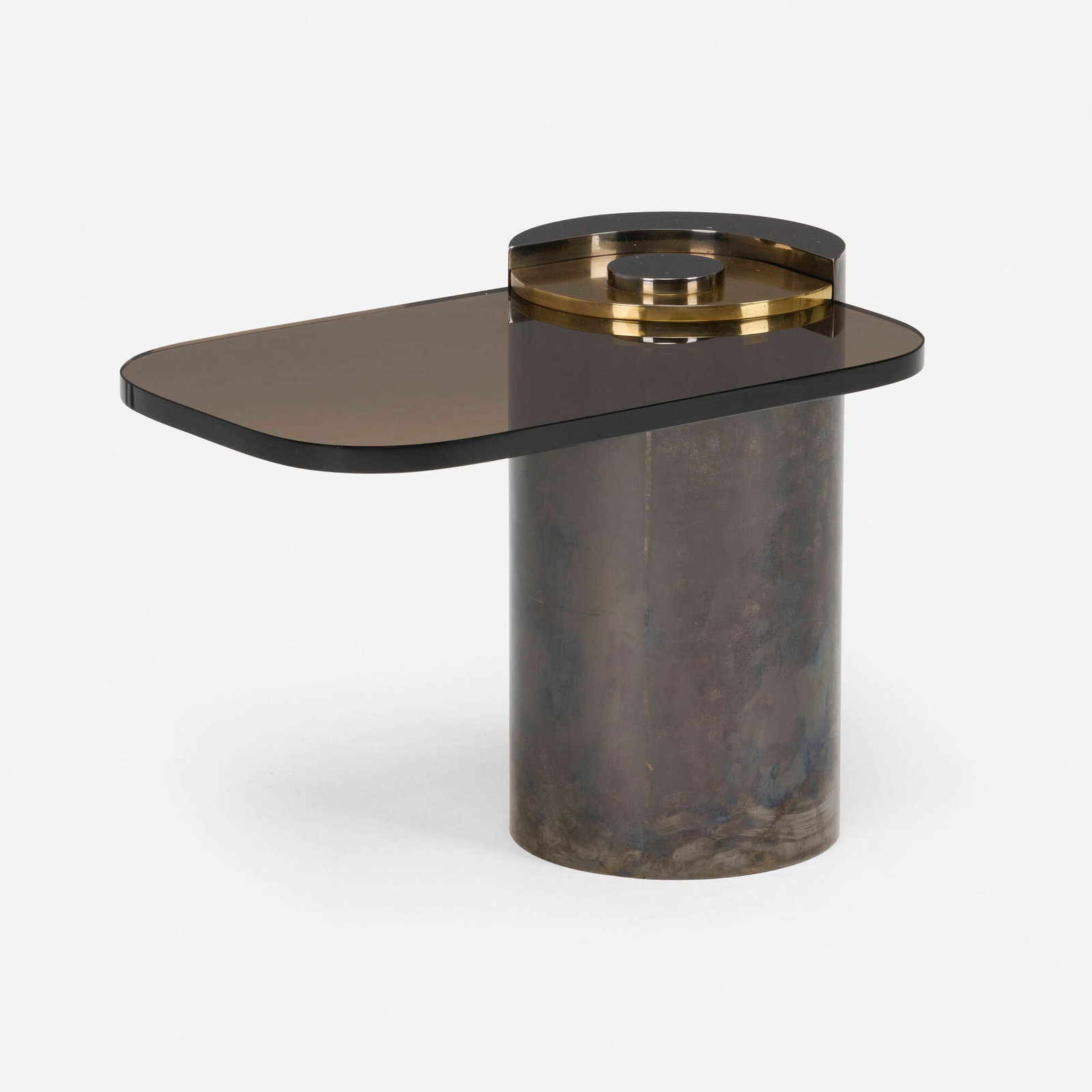 Karl Springer, Sculpture Leg table: Karl Springer Sculpture Leg table Karl Springer, Ltd. USA, c. 1970 gunmetal-plated brass, smoked glass, brass-plated bronze 18.25 h x 24.25 w x 16.125 d in (46 x 62 x 41 cm) Incised signature to