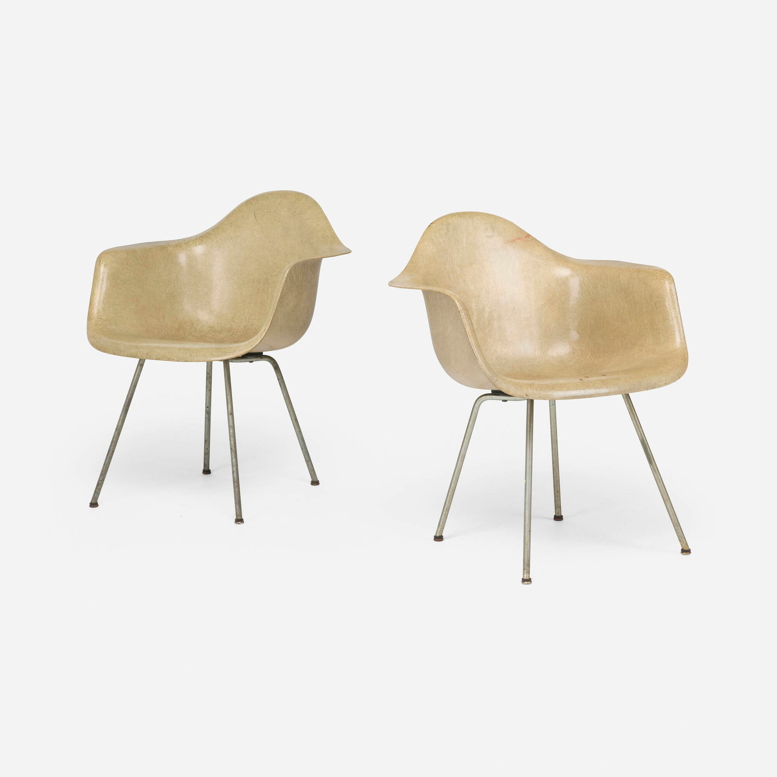 Charles and Ray Eames, DAXs, pair: Charles and Ray Eames DAXs, pair Herman Miller USA, 1950 molded fiberglass, steel, rubber 29.5 h x 24.75 w x 24 d in (75 x 63 x 61 cm) Decal manufacturer's label to underside of both examples