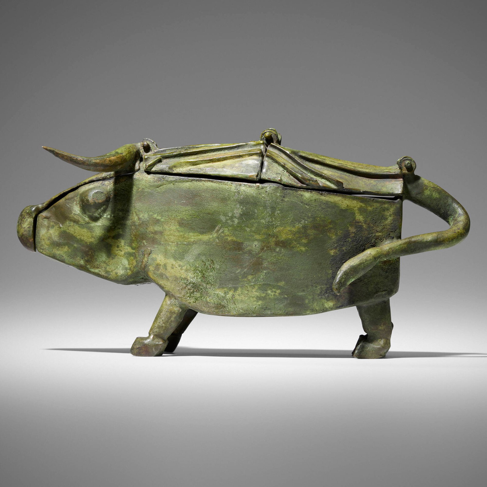 John Kearney, Water Buffalo: John Kearney Water Buffalo patinated bronze 4.75 h x 5.25 w x 10.5 d in (12 x 13 x 27 cm) Cast signature to proper left rear haunch 'Kearney'. Incised inscription to underside '94-4