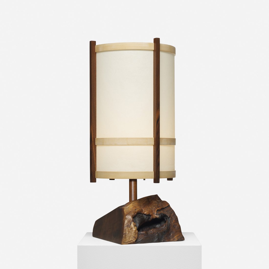 George Nakashima table lamp: George Nakashima table lamp USA, 1976 American black walnut root, holly, parchment, oak 13.25 w x 13.25 d x 27.25 h inches Highly-figured base with free edges, burl details, expressive sap grain and a