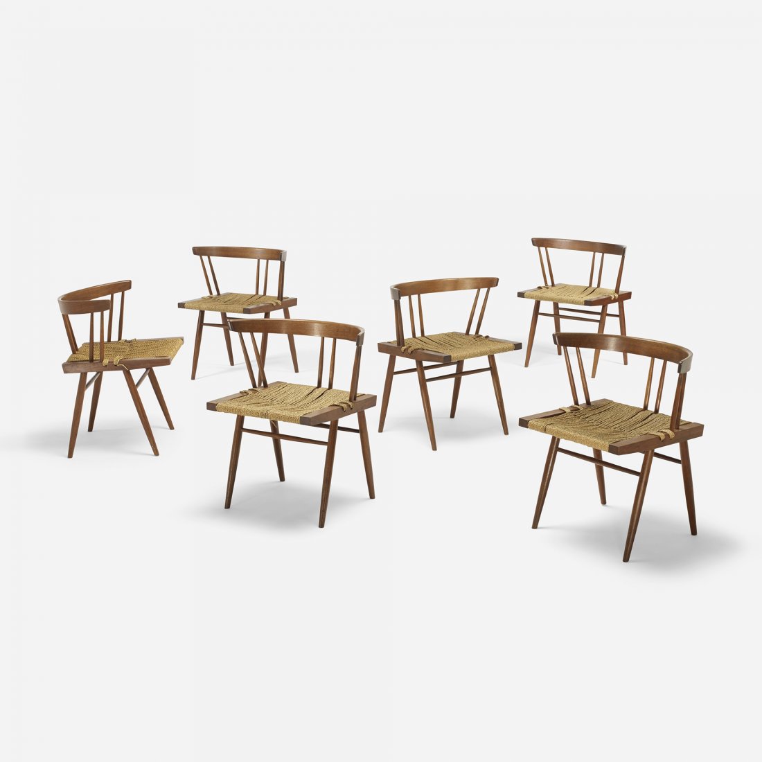 George Nakashima Grass-seated chairs, set of six: George Nakashima Grass-seated chairs, set of six USA, c. 1965 American black walnut, woven sea-grass 22.5 w x 20 d x 26.5 h inches Literature: George Nakashima, Woodworkers, studio catalog, unpaginate