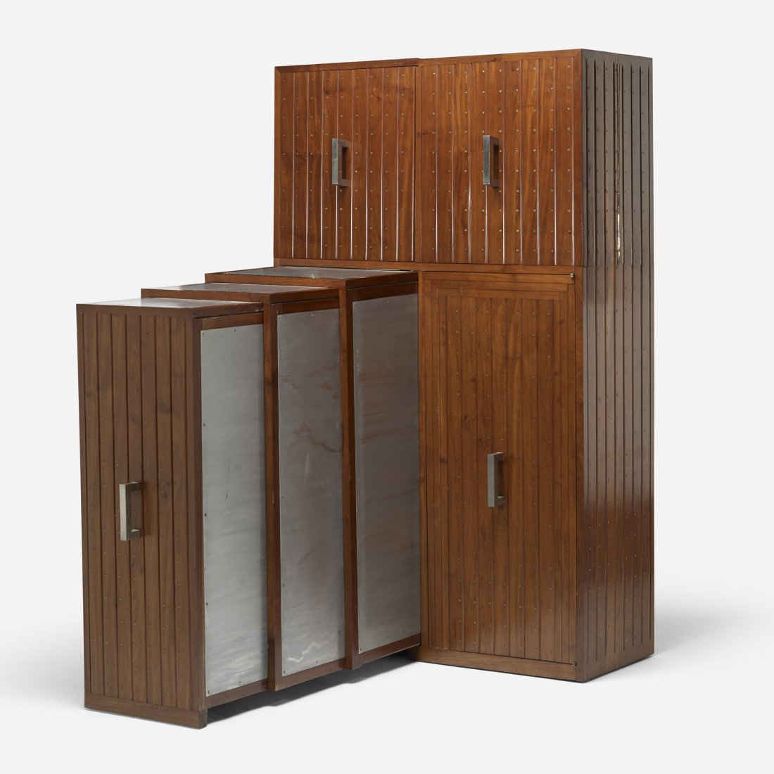 In the manner of Mallet-Stevens bar cabinet: In the manner of Robert Mallet-Stevens bar cabinet France, c. 1925 walnut, matte chrome-plated brass, brass 39.5 w x 17.5 d x 67.25 h inches Cabinet features two doors concealing thirty storage boxes