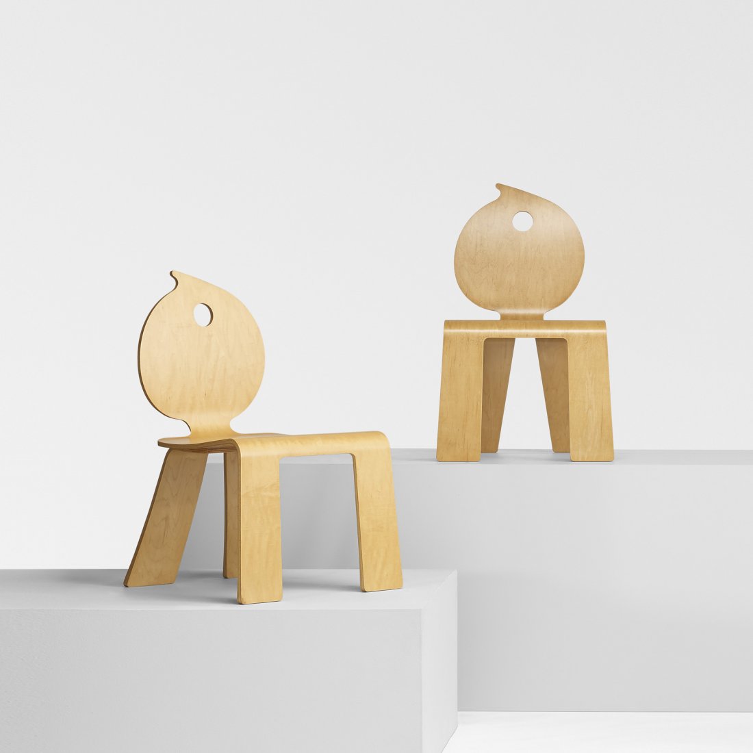 Robert Venturi pair of Swirl chairs: Robert Venturi pair of Swirl chairs from the Mielmonte Resort Hotel Knoll International USA, 1994-1995 birch plywood 20.5 w x 22 d x 32.75 h inches Literature: Out of the Ordinary: Robert Venturi, Den