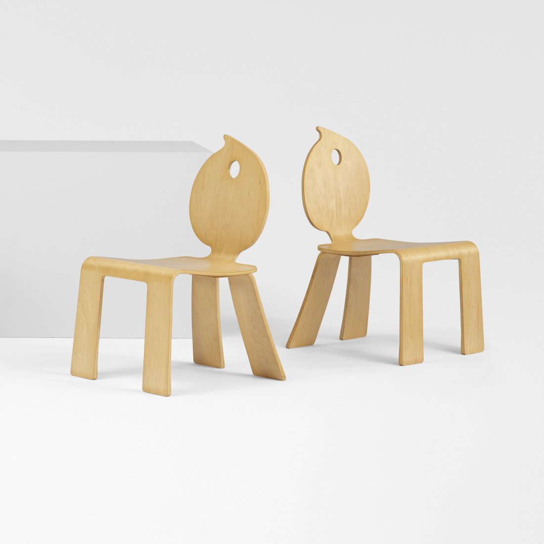 Robert Venturi pair of Swirl chairs: Robert Venturi pair of Swirl chairs from the Mielmonte Resort Hotel Knoll International USA, 1994-1995 birch plywood 20.5 w x 22.5 d x 32.75 h inches Literature: Out of the Ordinary: Robert Venturi, D