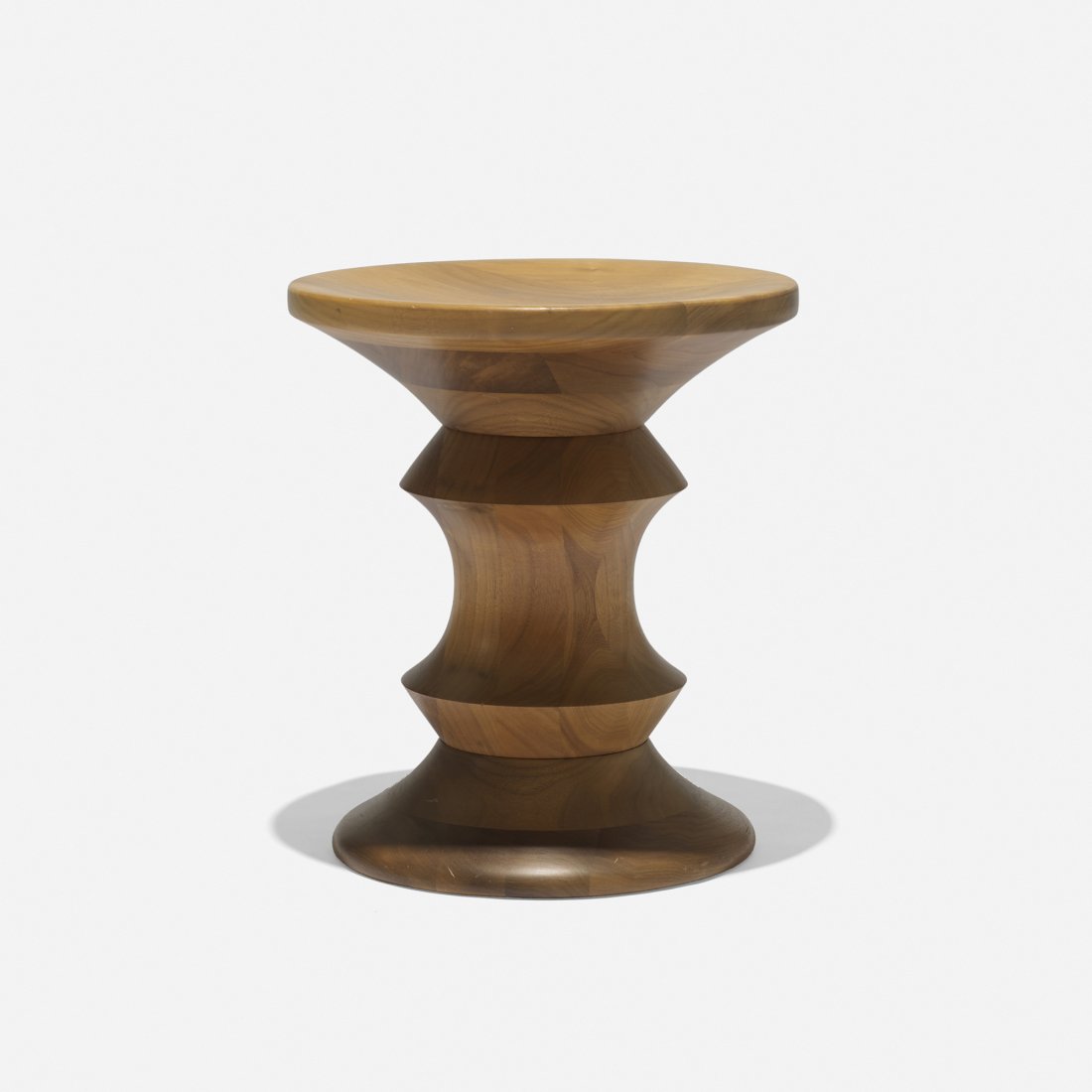 Charles and Ray Eames Time Life stool: Charles and Ray Eames Time Life stool Herman Miller USA, 1960/c. 2000 walnut 13 dia x 15 h inches Literature: Eames Design: The Work of the Office of Charles and Ray Eames, Neuhart, Neuhart and Eames,