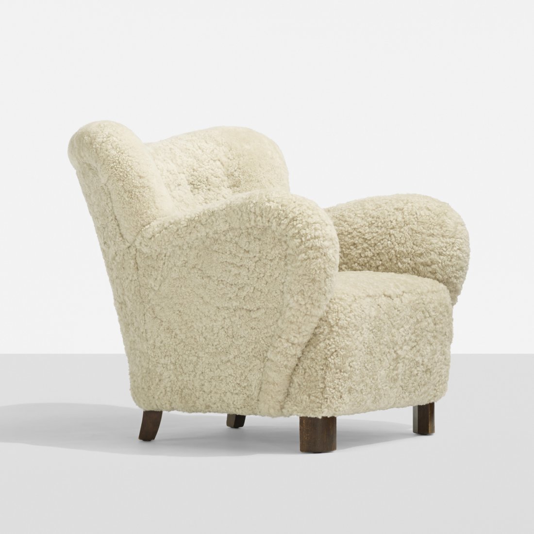 Flemming Lassen, attribution lounge chair: Flemming Lassen, attribution lounge chair Denmark, c. 1940 sheepskin, stained beech 34 w x 35 d x 33 h inches