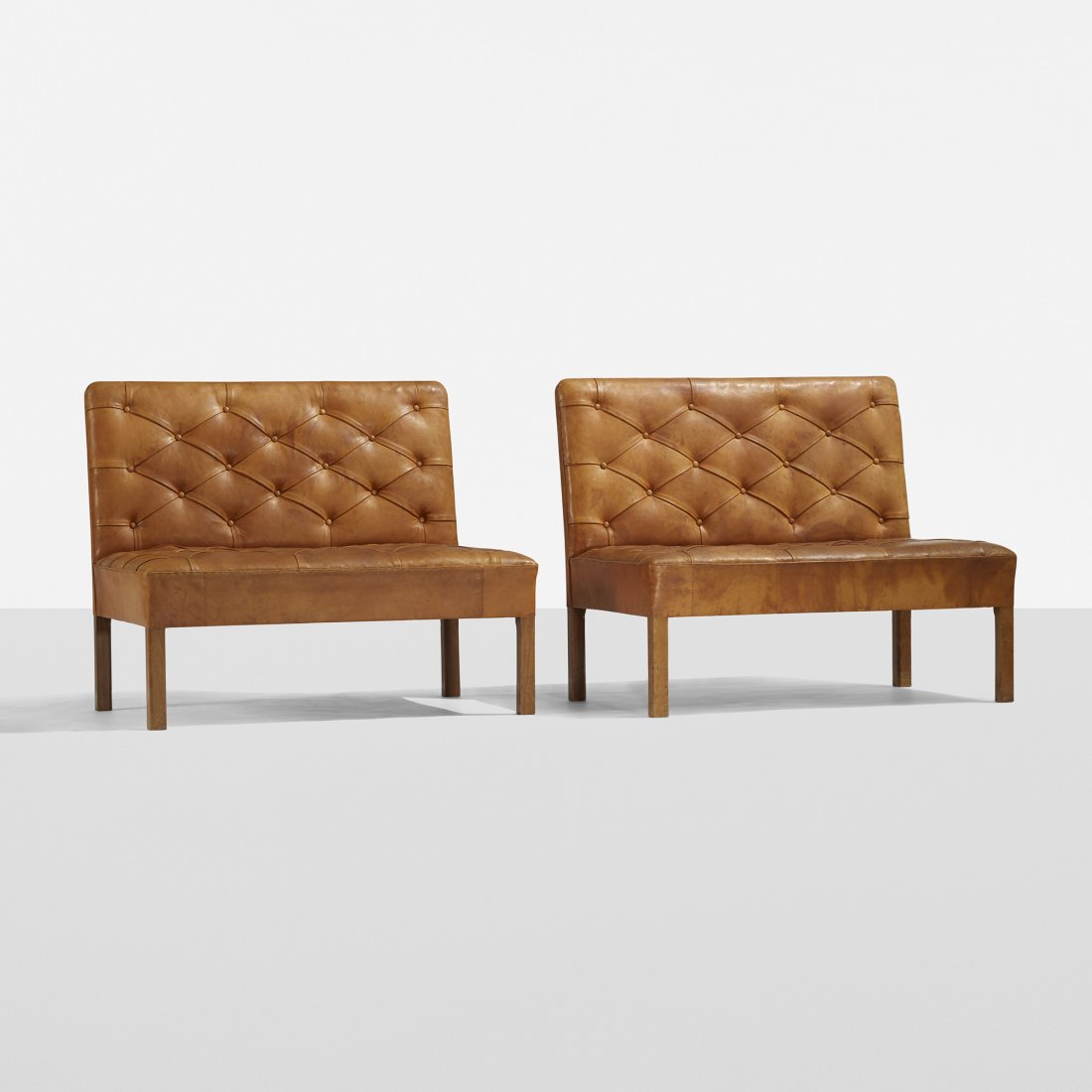 Kaare Klint Additions settees model 4698, pair: Kaare Klint Additions settees model 4698, pair Rud. Rasmussens Snedkerier Denmark, 1933 Niger goatskin, Cuban mahogany 37 w x 28 d x 31 h inches Literature: Kaare Klint, vol. 2, Harkaer, pg. 40