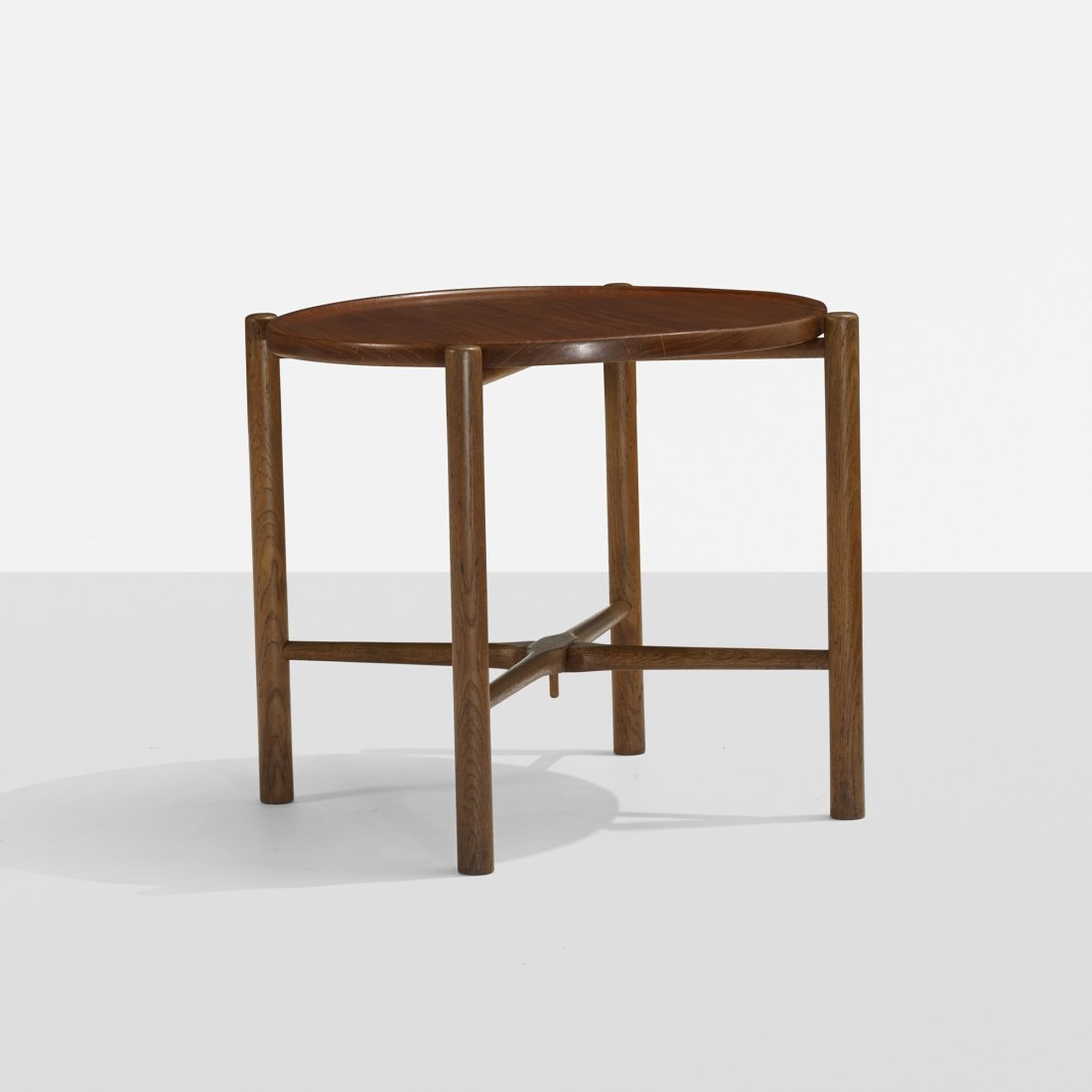 Hans Wegner folding tray table, model AT35: Hans Wegner folding tray table, model AT35 Andreas Tuck Denmark, c. 1960 teak, stained oak 24 w x 24 d x 19 h inches Signed with branded manufacturer's mark to stretcher: [Fabrikat: Andr Tuck Arkitekt