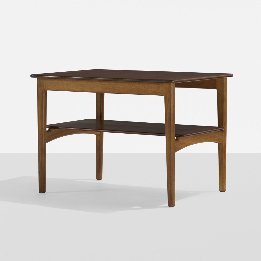 Hans Wegner occasional table: Hans Wegner occasional table Johannes Hansen Denmark, c. 1959 teak, stained oak 29 w x 21 d x 20.5 h inches Signed with branded manufacturer's mark to frame: [Johannes Hansen Copenhagen Denmark]. Lite