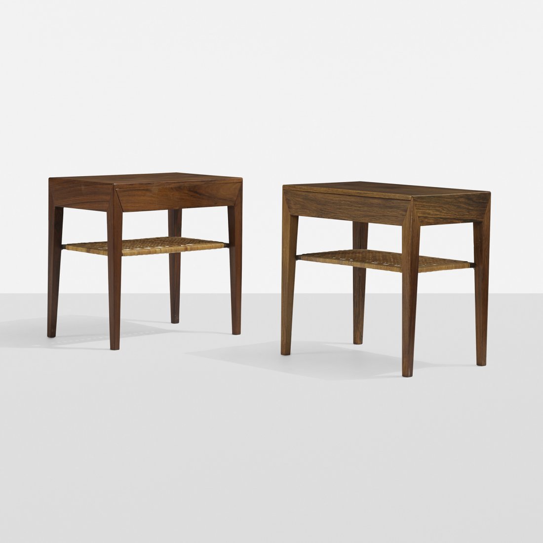 Severin Hansen nightstands, pair: Severin Hansen nightstands, pair Haslev Mobelsnedkeri A/S Denmark, c. 1965 rosewood, cane 18.75 w x 12 d x 18 h inches Each nightstand features a single drawer. Signed with applied paper distributor's