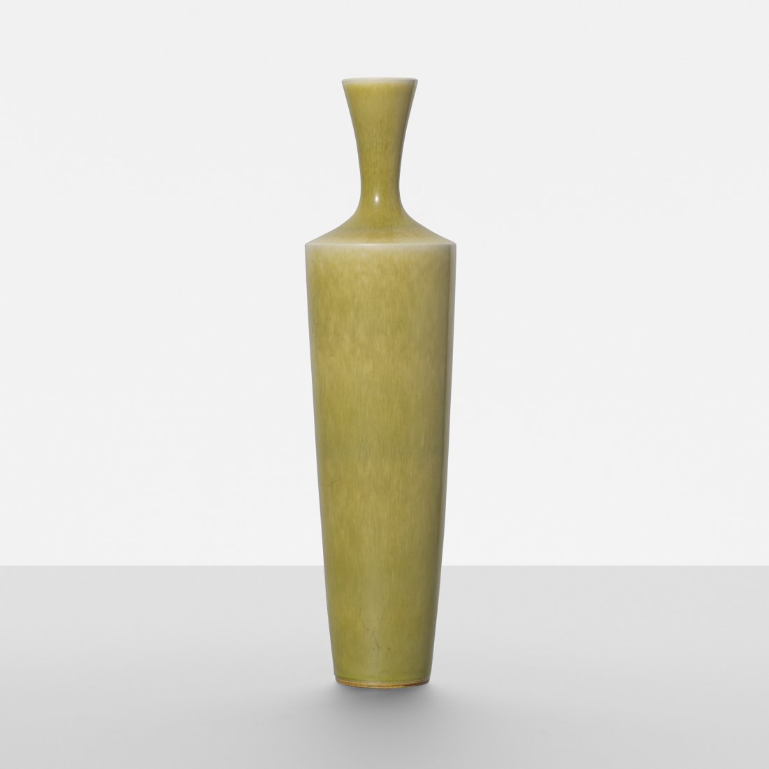 Berndt Friberg vase: Berndt Friberg vase Gustavsberg Sweden, 1973 glazed stoneware 3.75 dia x 14.5 h inches Signed with partially applied manufacturer's label to underside: [Gustavsberg Sweden]. Incised signature to under
